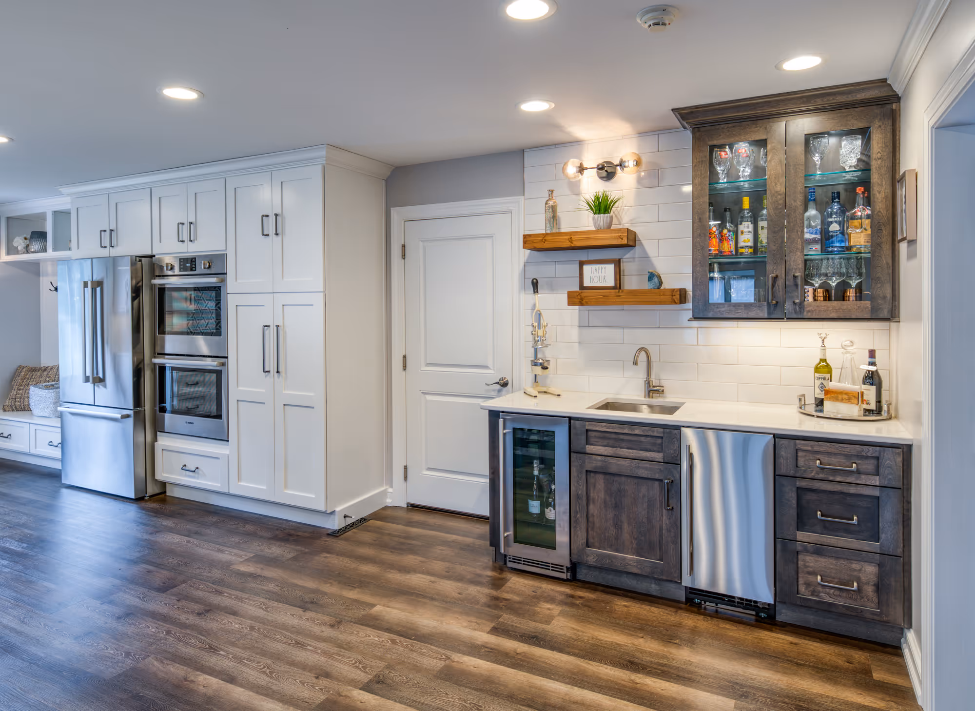 Modern kitchen remodel with dark wood cabinets, white quartz countertops, and stainless steel appliances in marysville, pa.