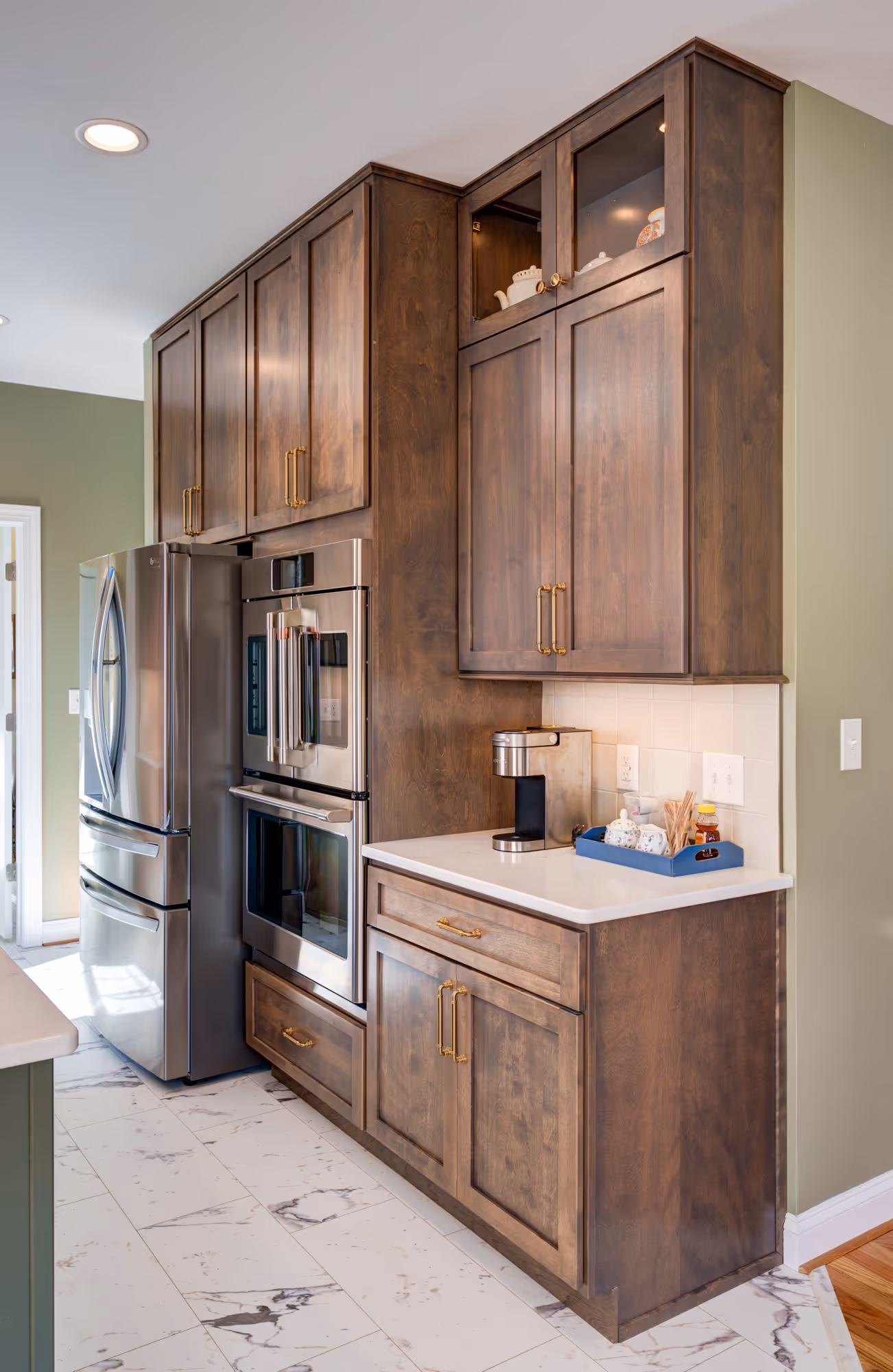 Modern kitchen design featuring wood cabinets, stainless steel appliances, and elegant decor in harrisburg, pa.