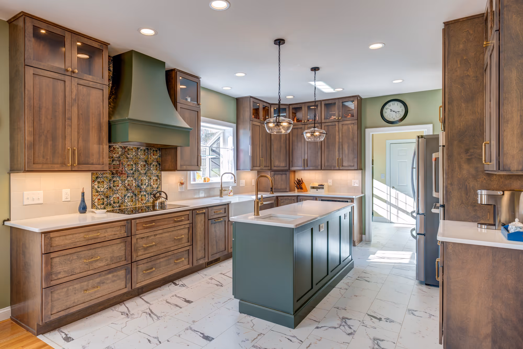 Modern farmhouse kitchen featuring wood cabinetry and green accents in Harrisburg, PA.