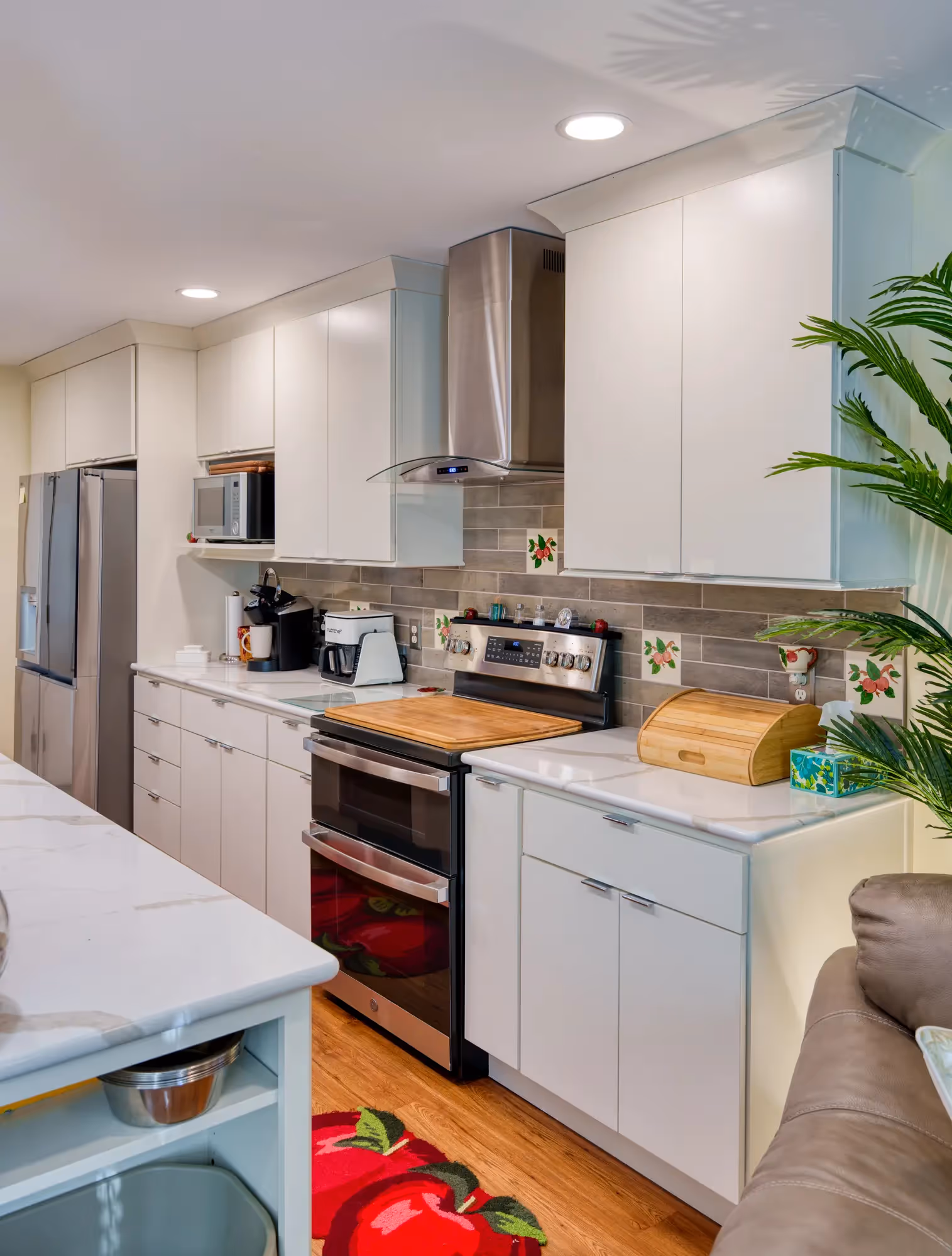 Updated kitchen with island, wooden floors