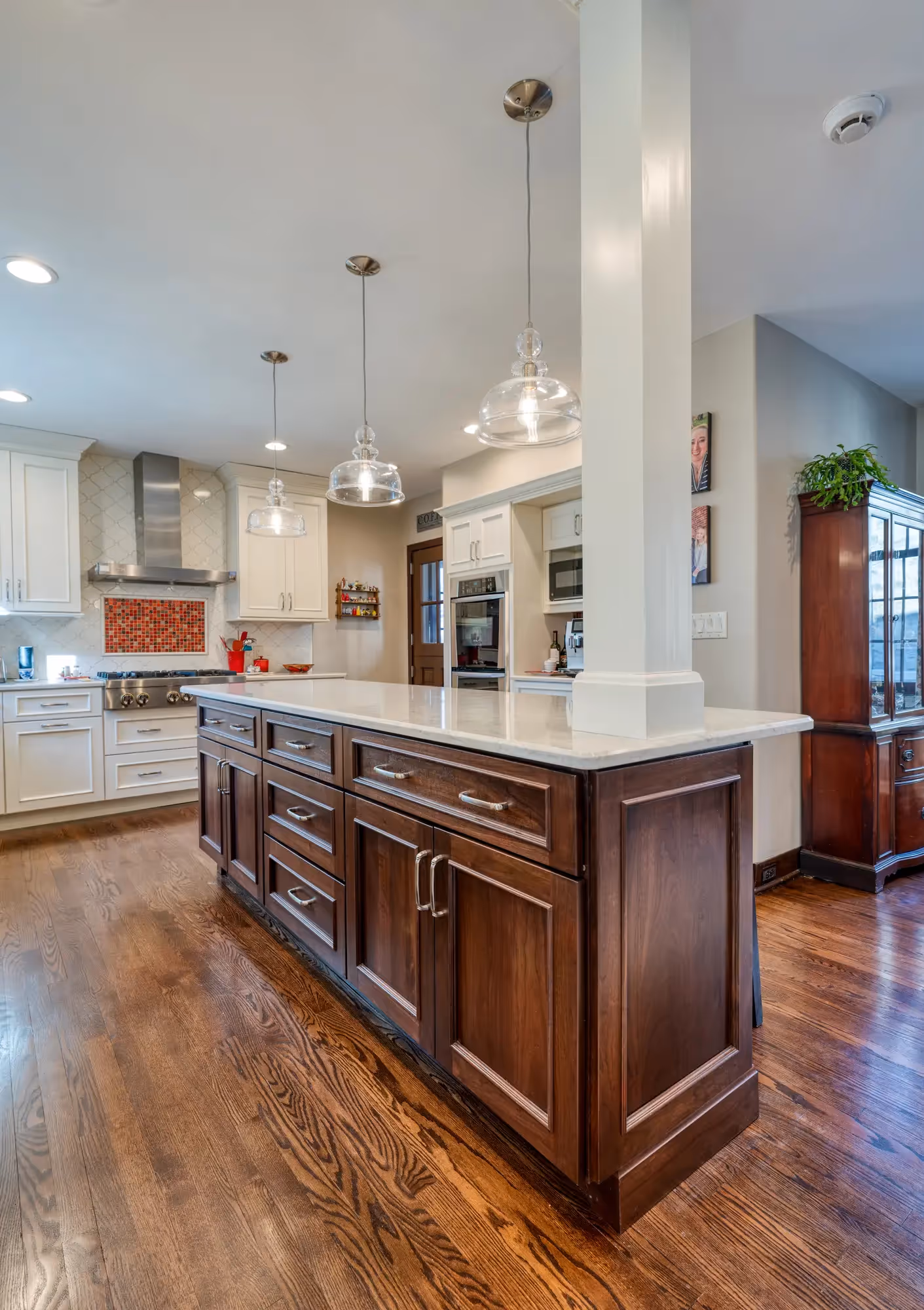 Spacious kitchen with a large island and bar stools