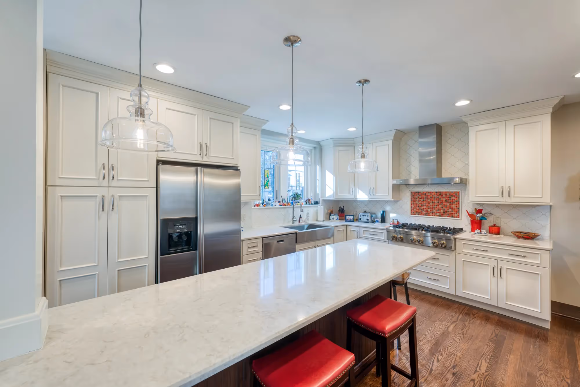 Kitchen with an island and modern appliances