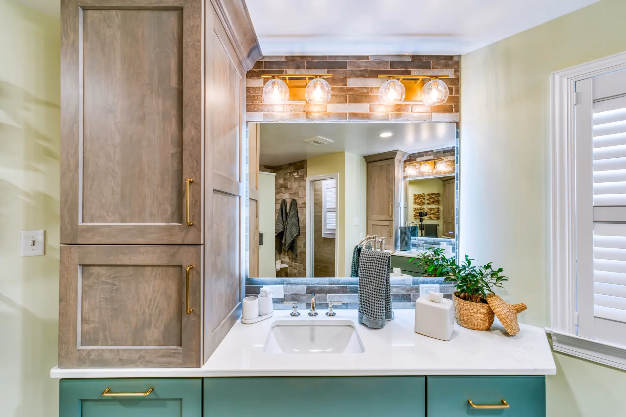 Modern laundry room with green storage cabinets