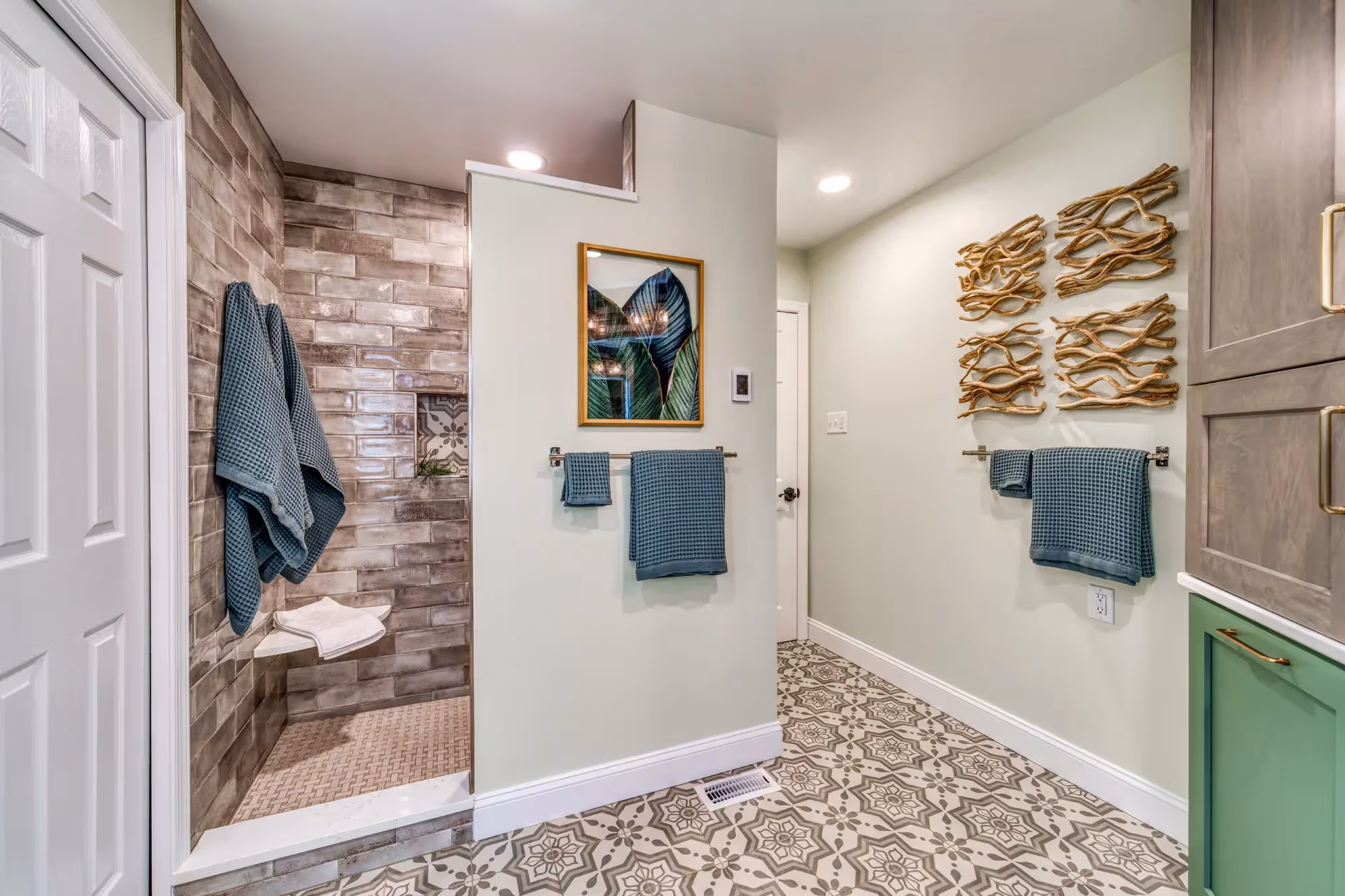 Modern laundry room with green storage cabinets