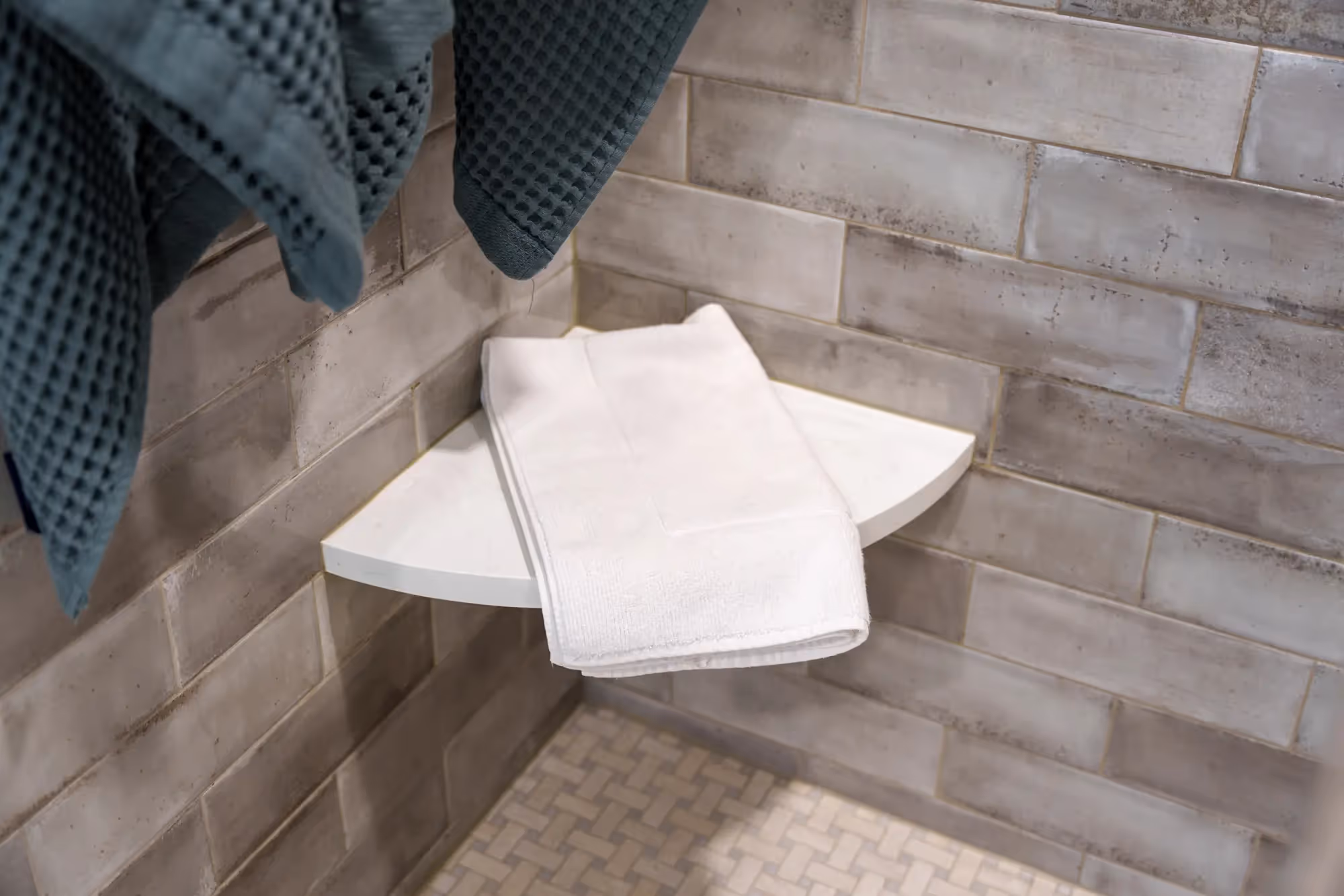 Stylish tiled wall with a decorative pattern and shelf