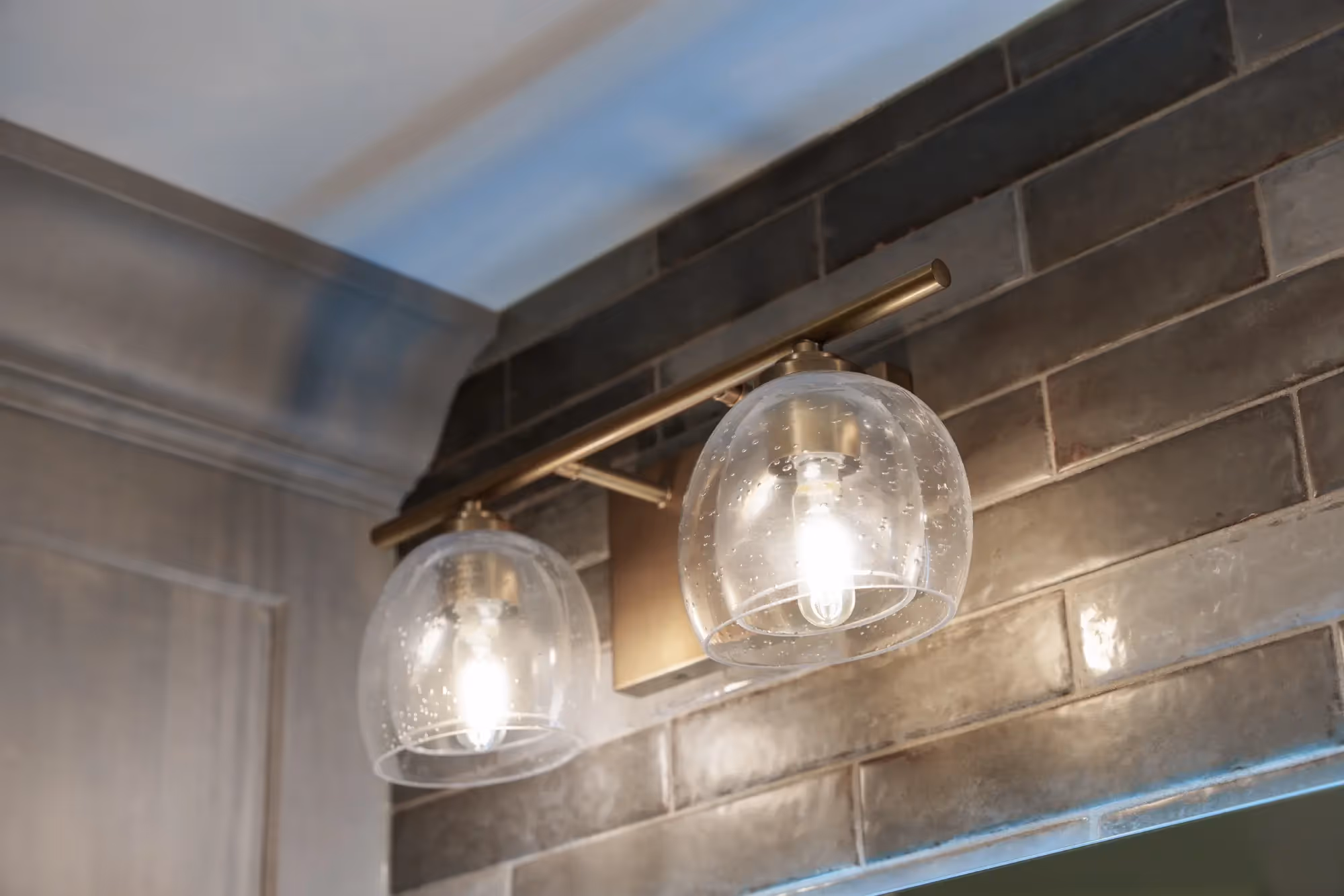 Stylish tiled wall with a decorative pattern and shelf