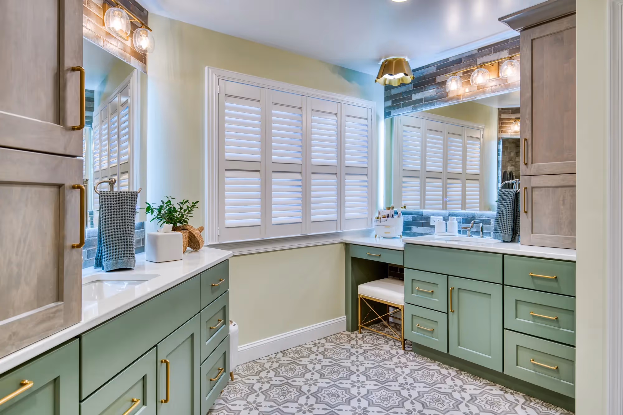 Renovated mudroom with green cabinets and natural light