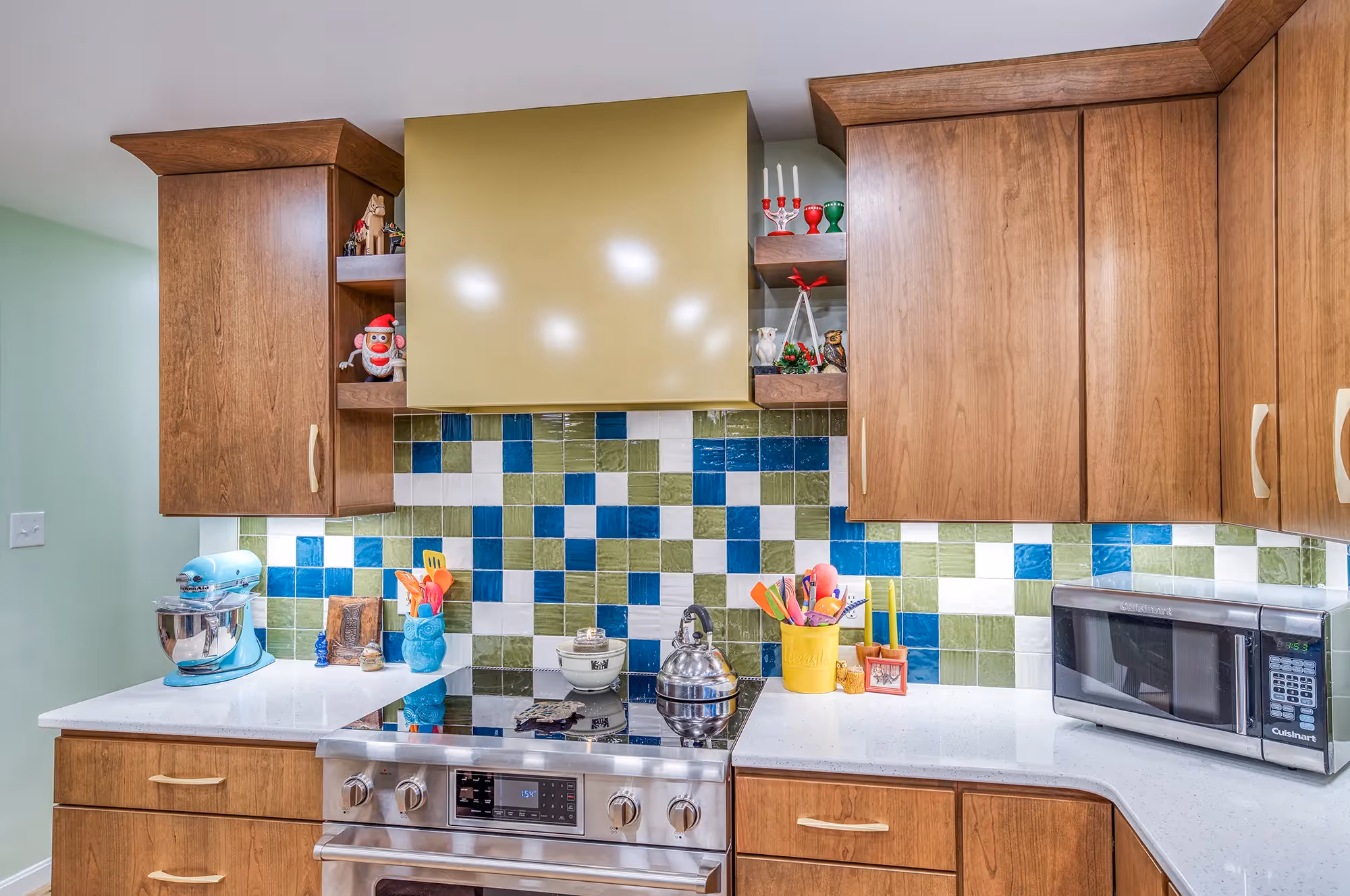 Kitchen with colorful tiles, wooden cabinets