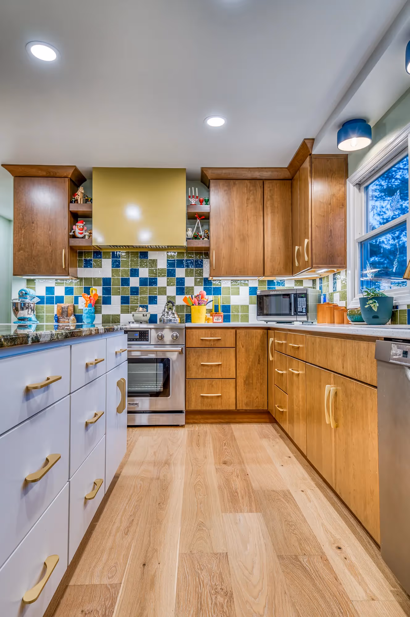 Kitchen with colorful tiles, wooden cabinetry