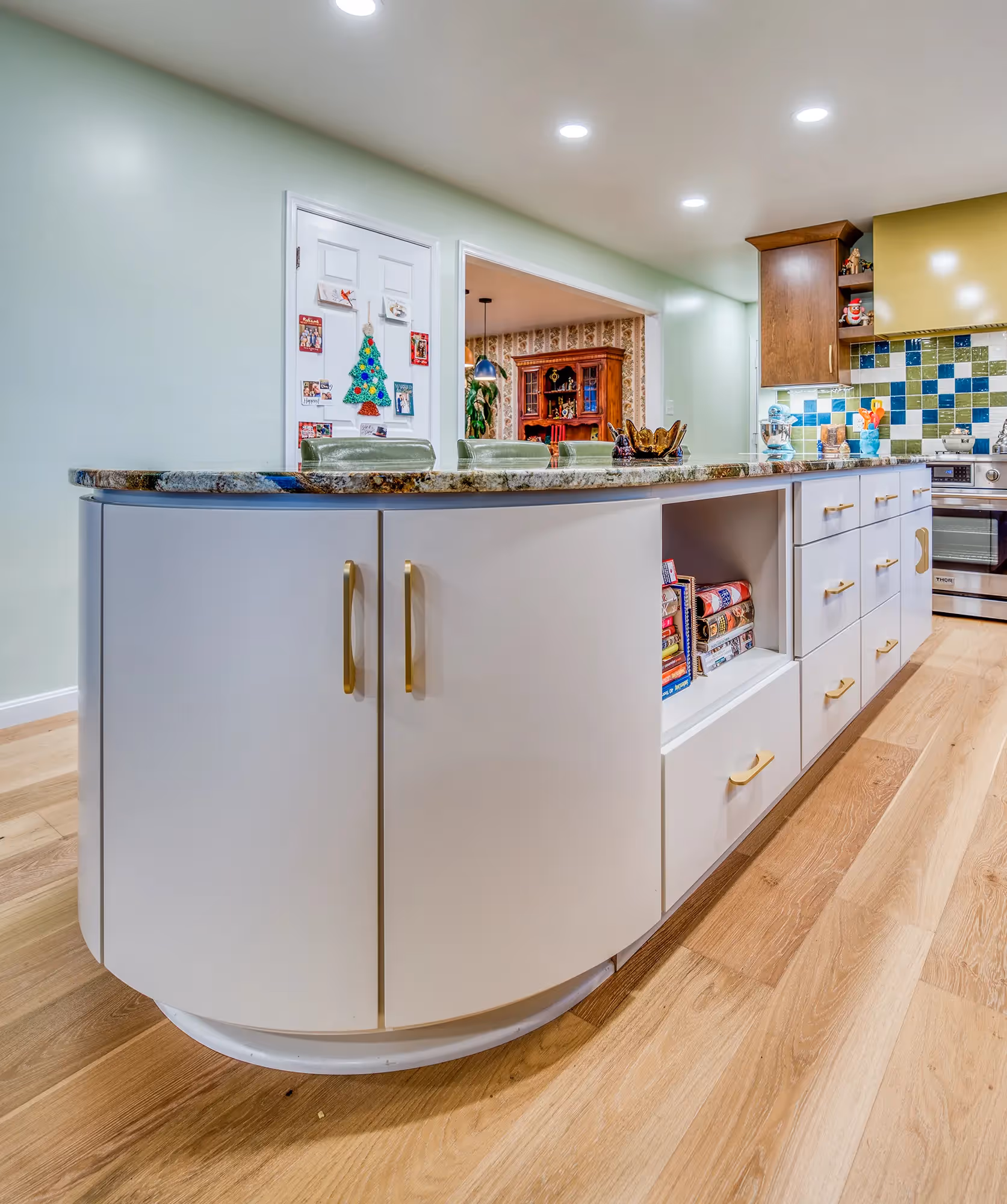 Kitchen with round island, sleek design