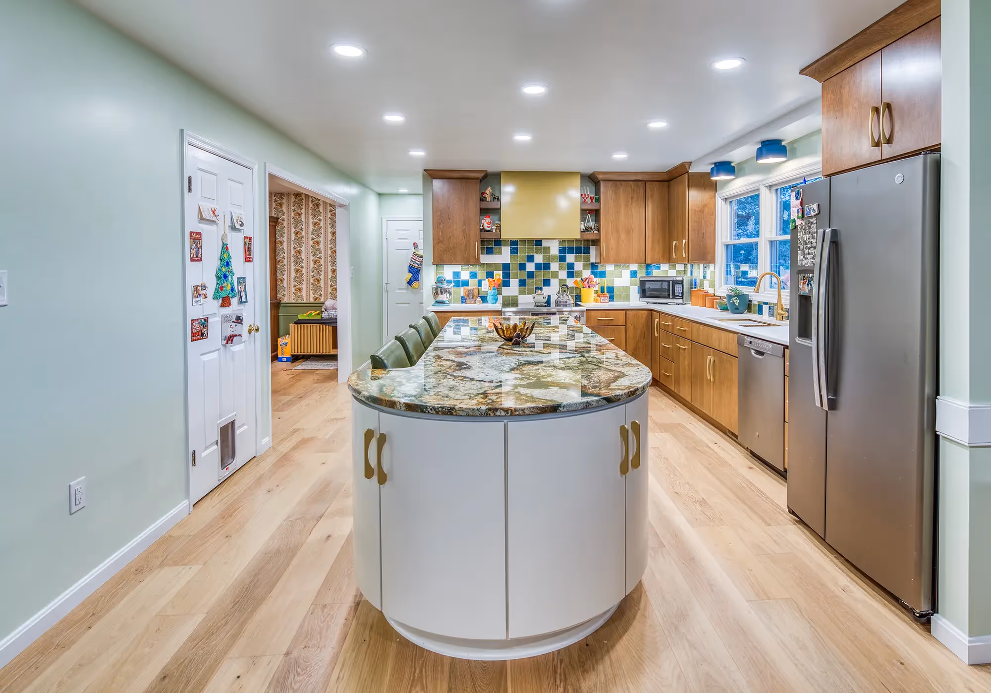 Kitchen with round island, sleek design