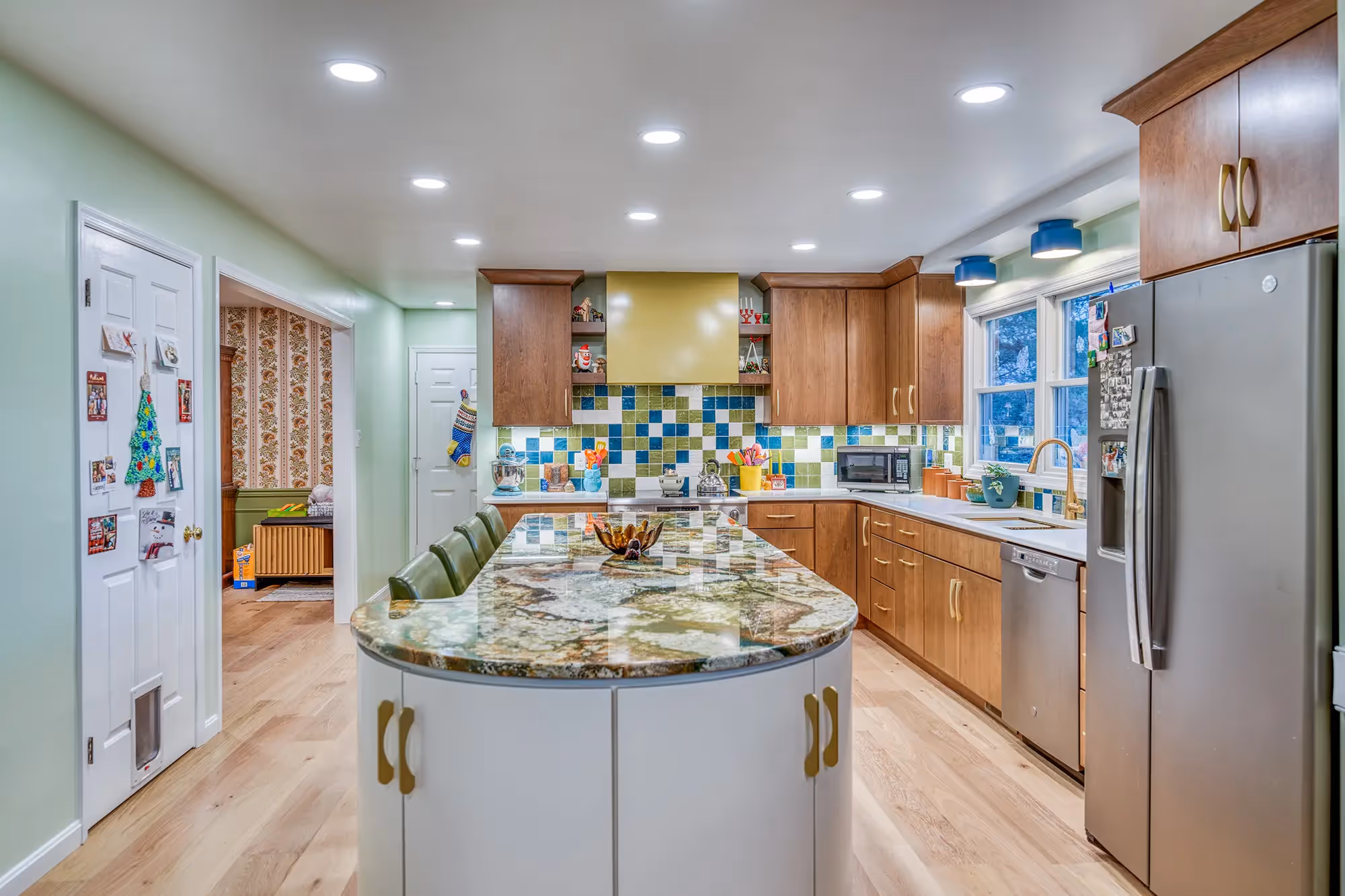 Kitchen with round island, sleek design