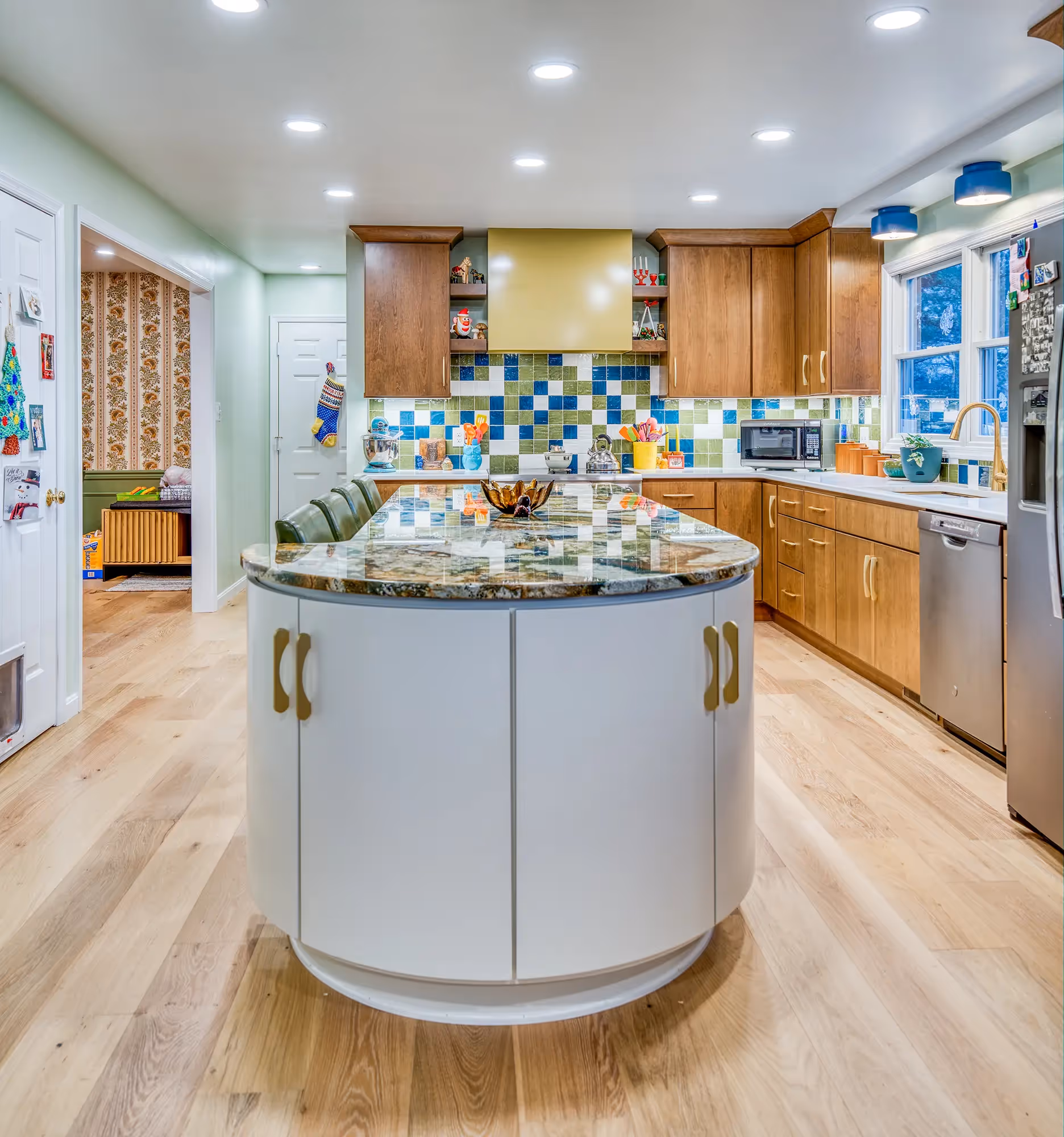 Kitchen with round island, sleek design