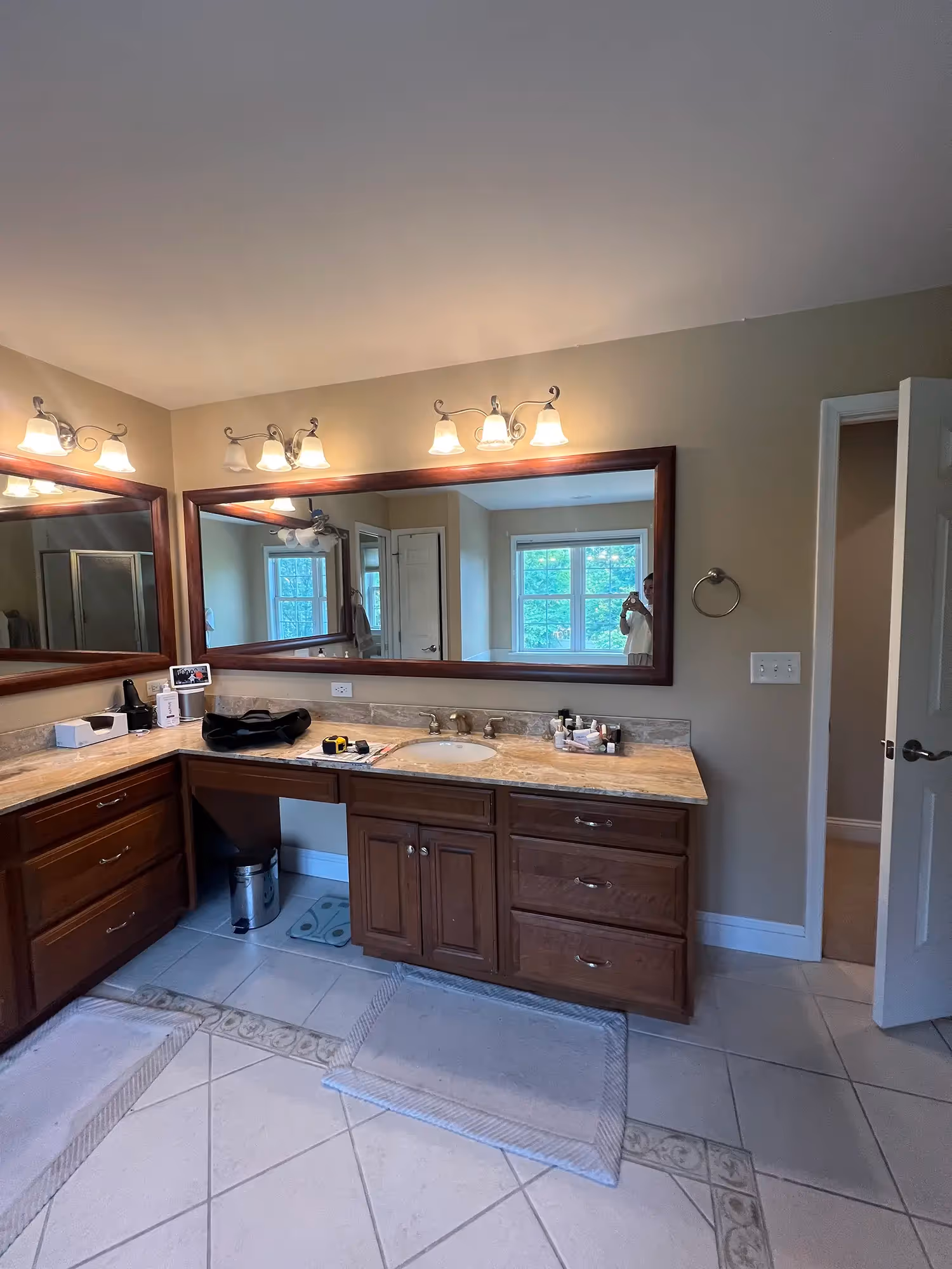 Bathroom with large window, simple fixtures