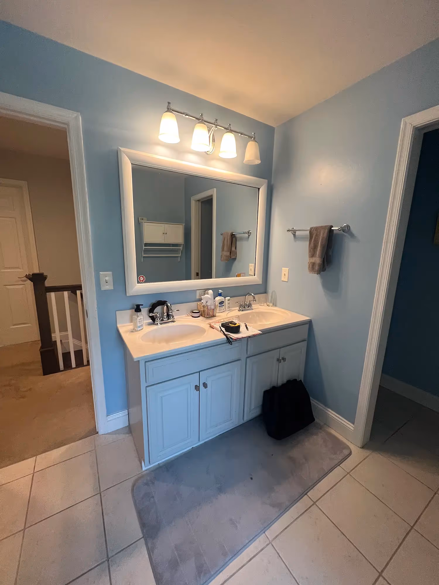 Bathroom with large window, simple fixtures