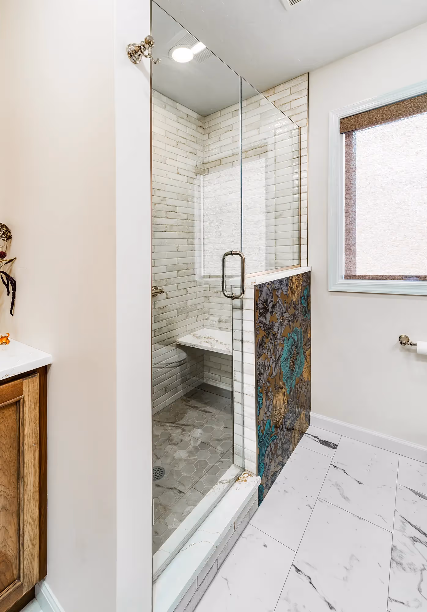 Spacious bathroom with dual sinks, wooden cabinetry