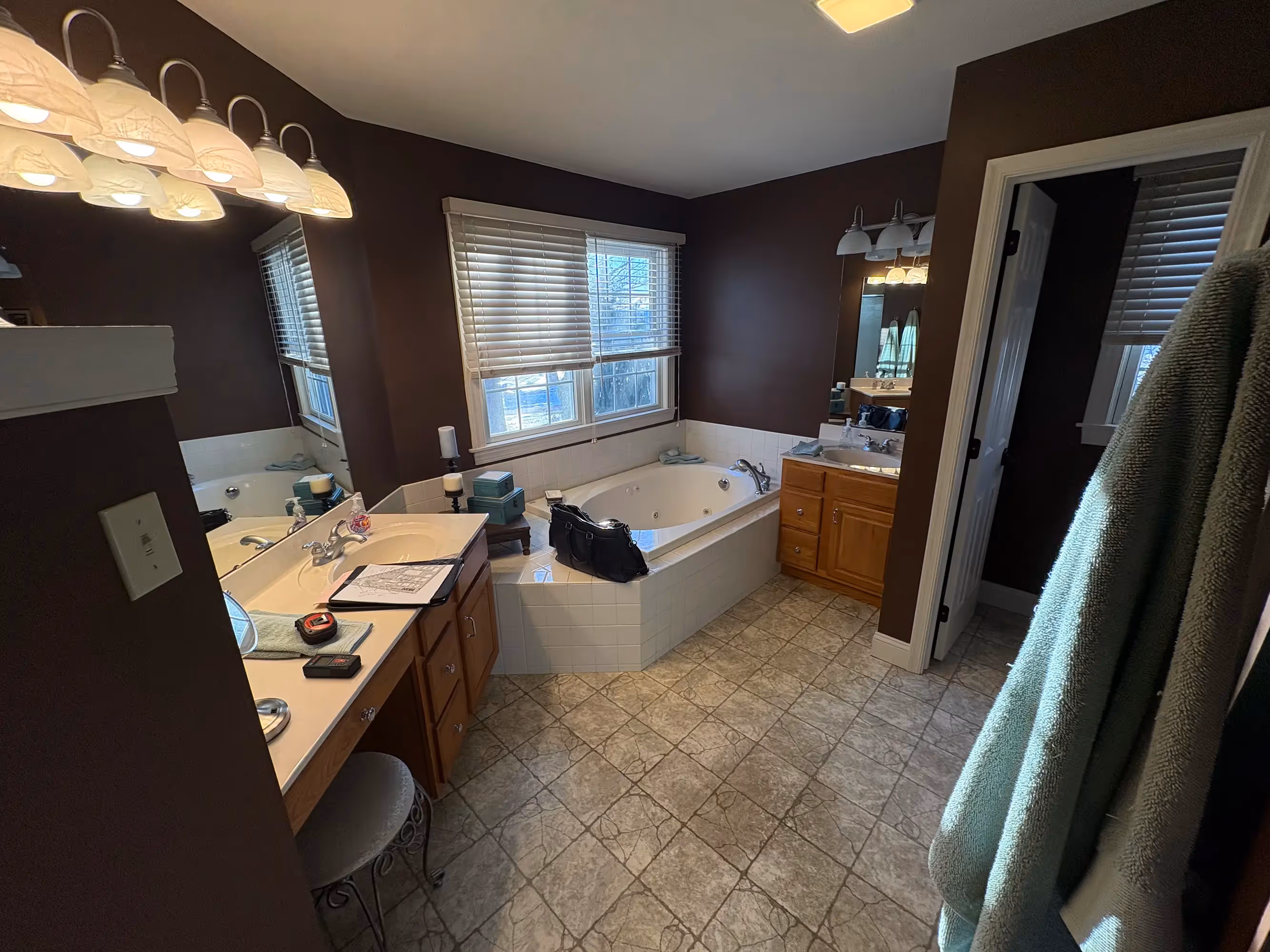 Bathroom with dark walls, vanity