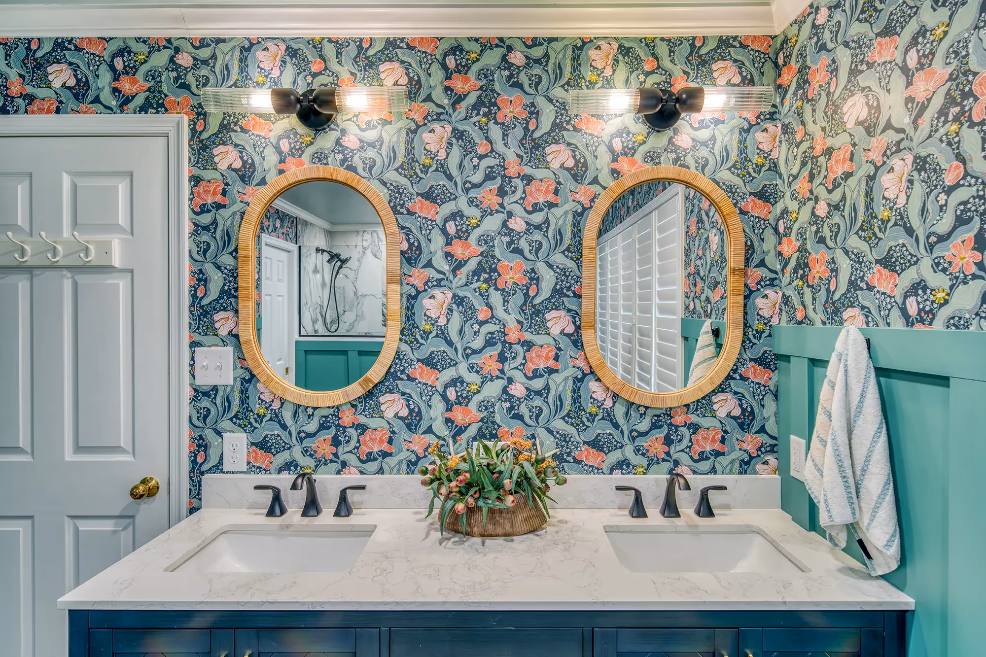 Bathroom sink with black faucets