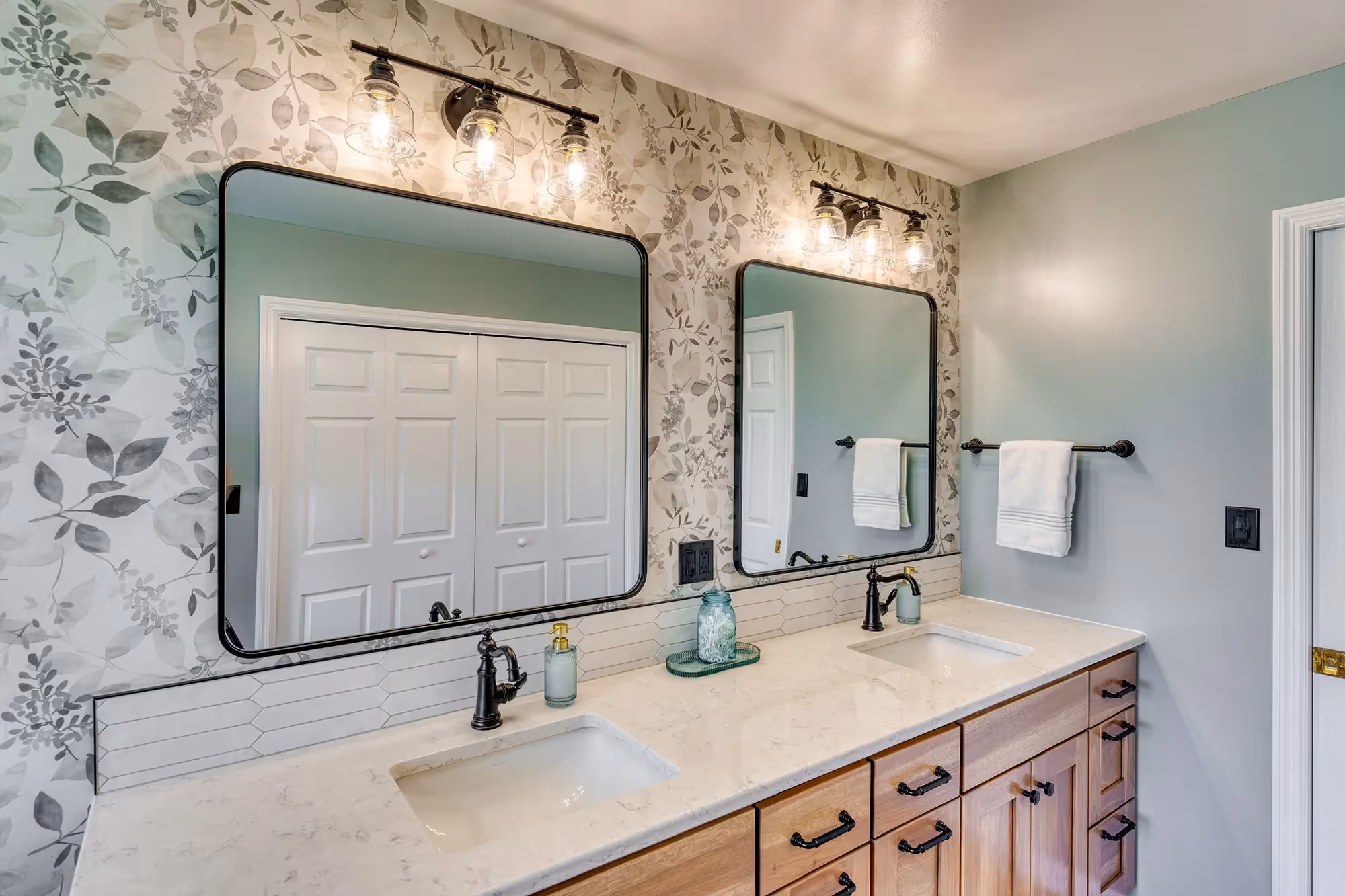 Spacious bathroom with wooden vanity