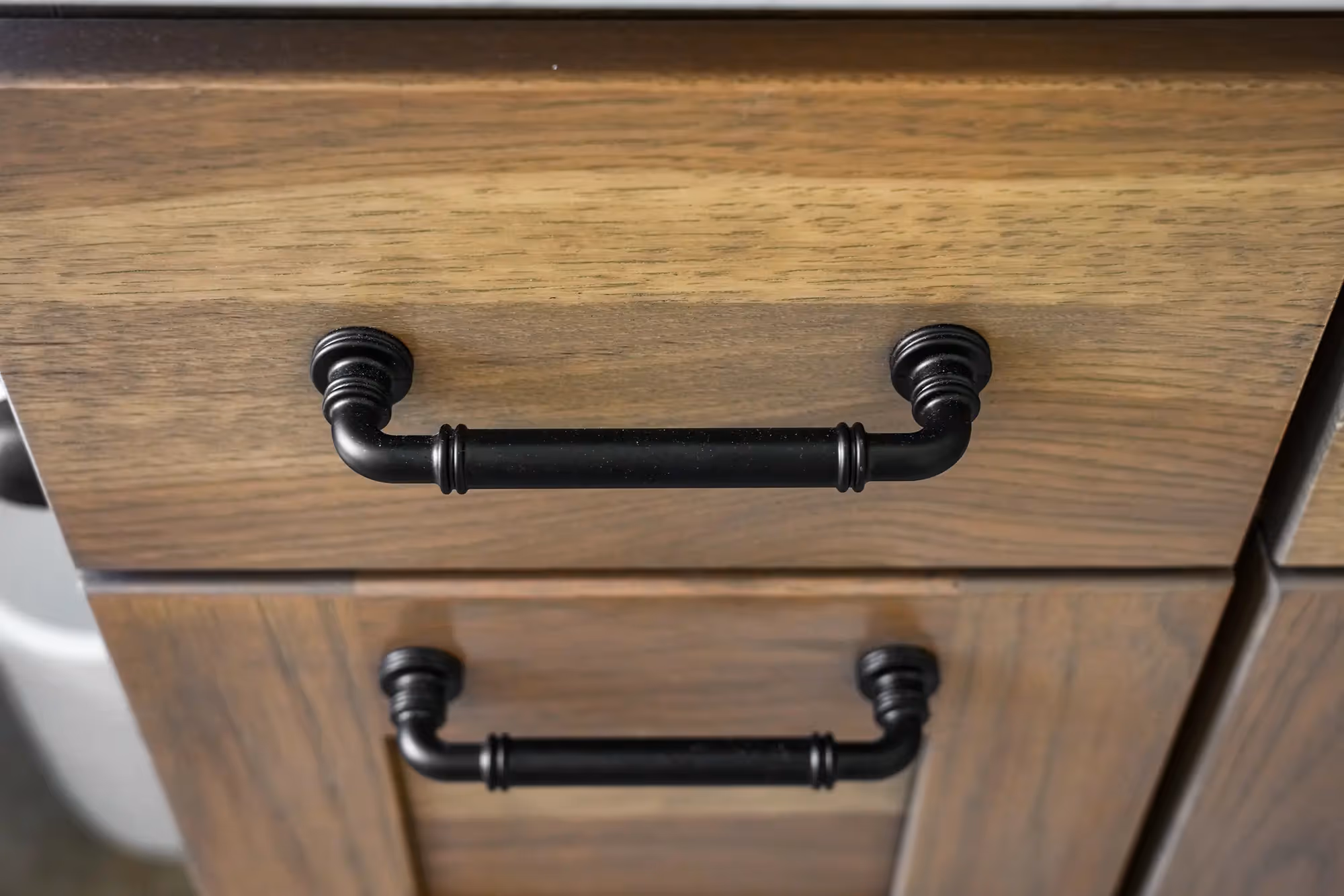 Shower wall with black fixtures, and contemporary styling