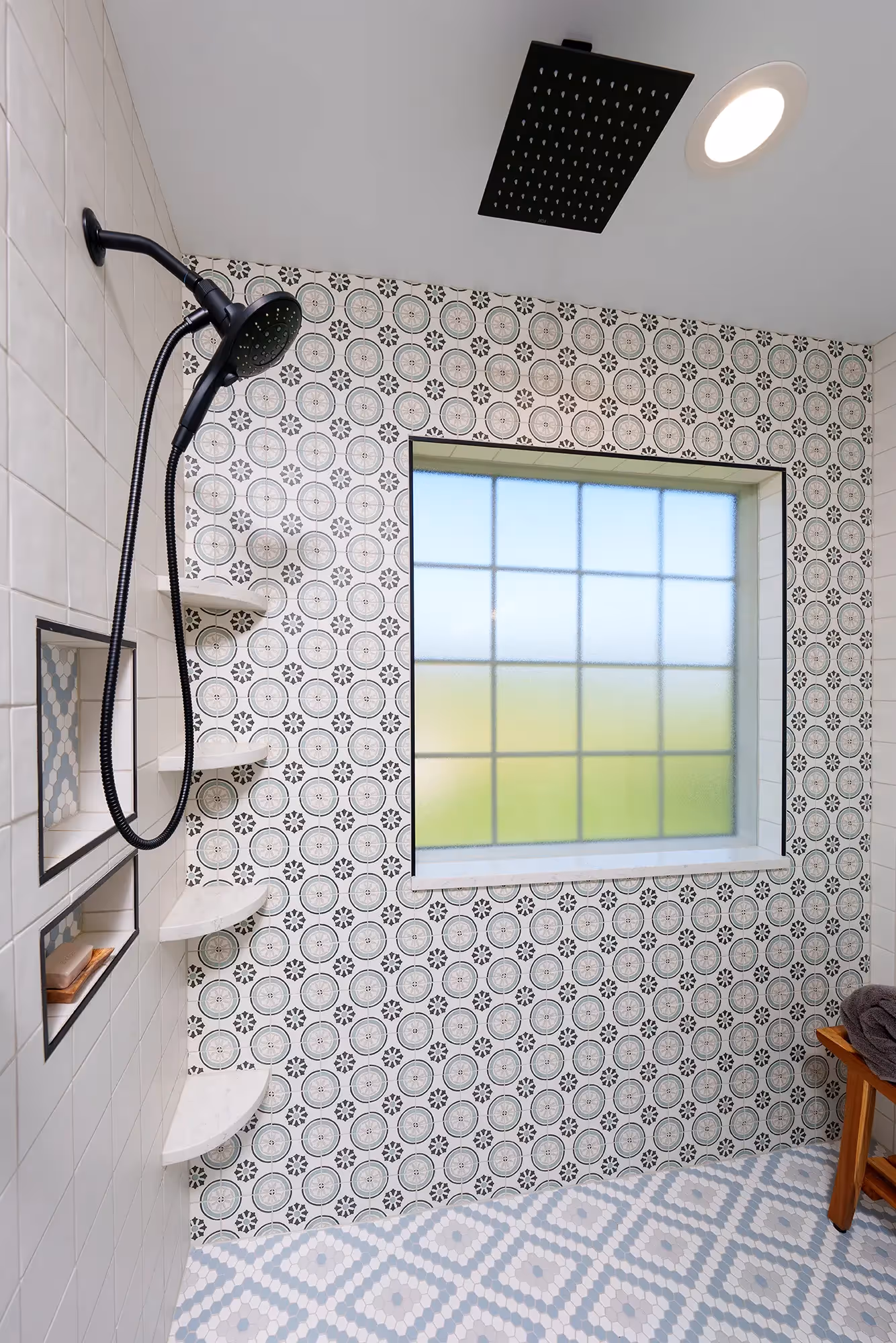 Stylish shower area with black fixtures