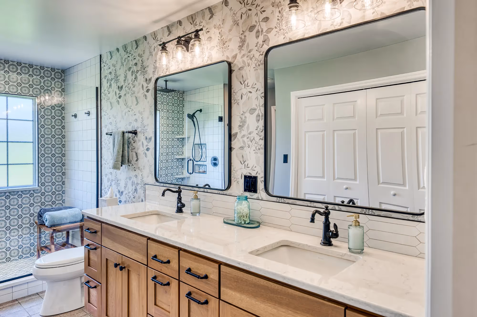 Spacious bathroom with wooden vanity