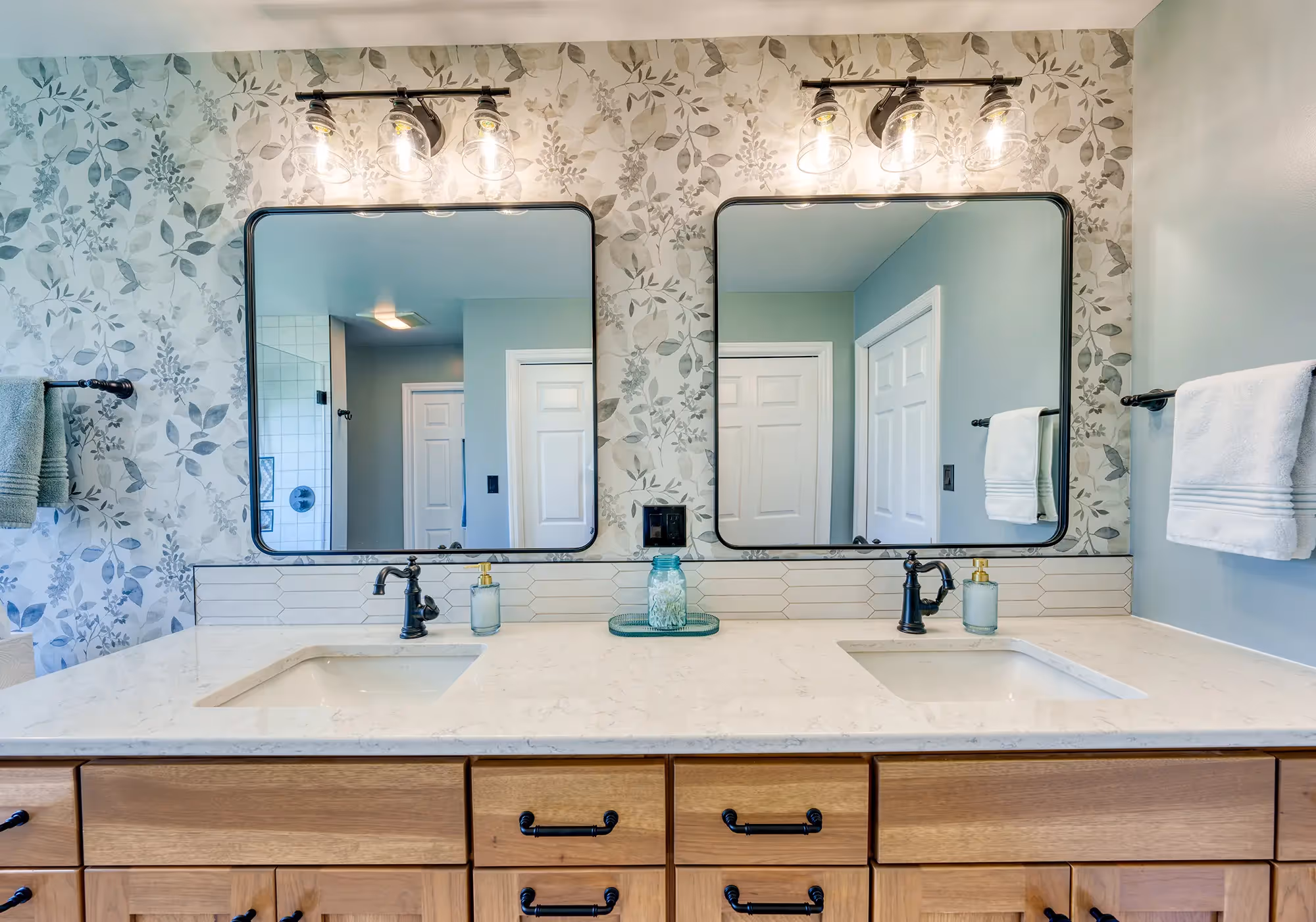 Spacious bathroom with wooden vanity