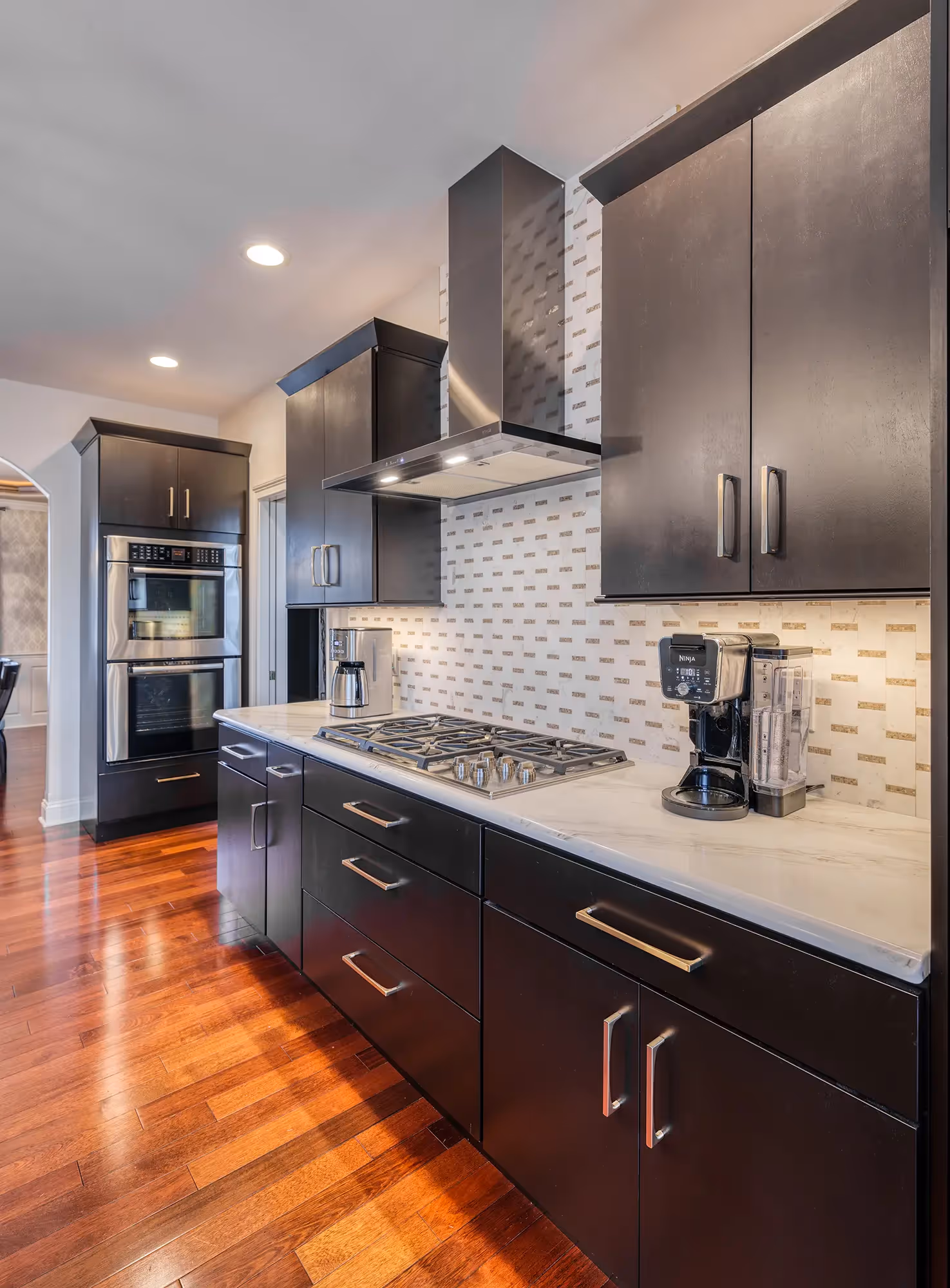 Modern kitchen with dark cabinets