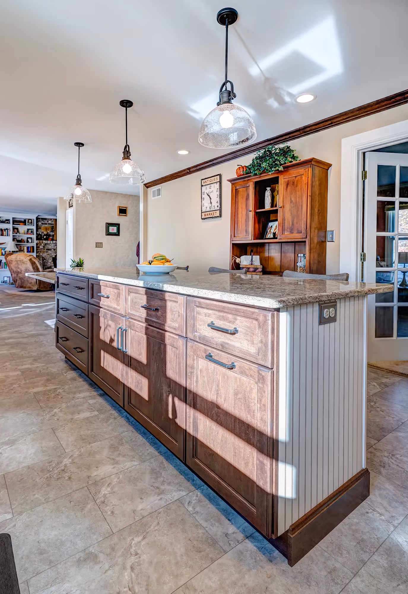 Open kitchen with wooden cabinetry