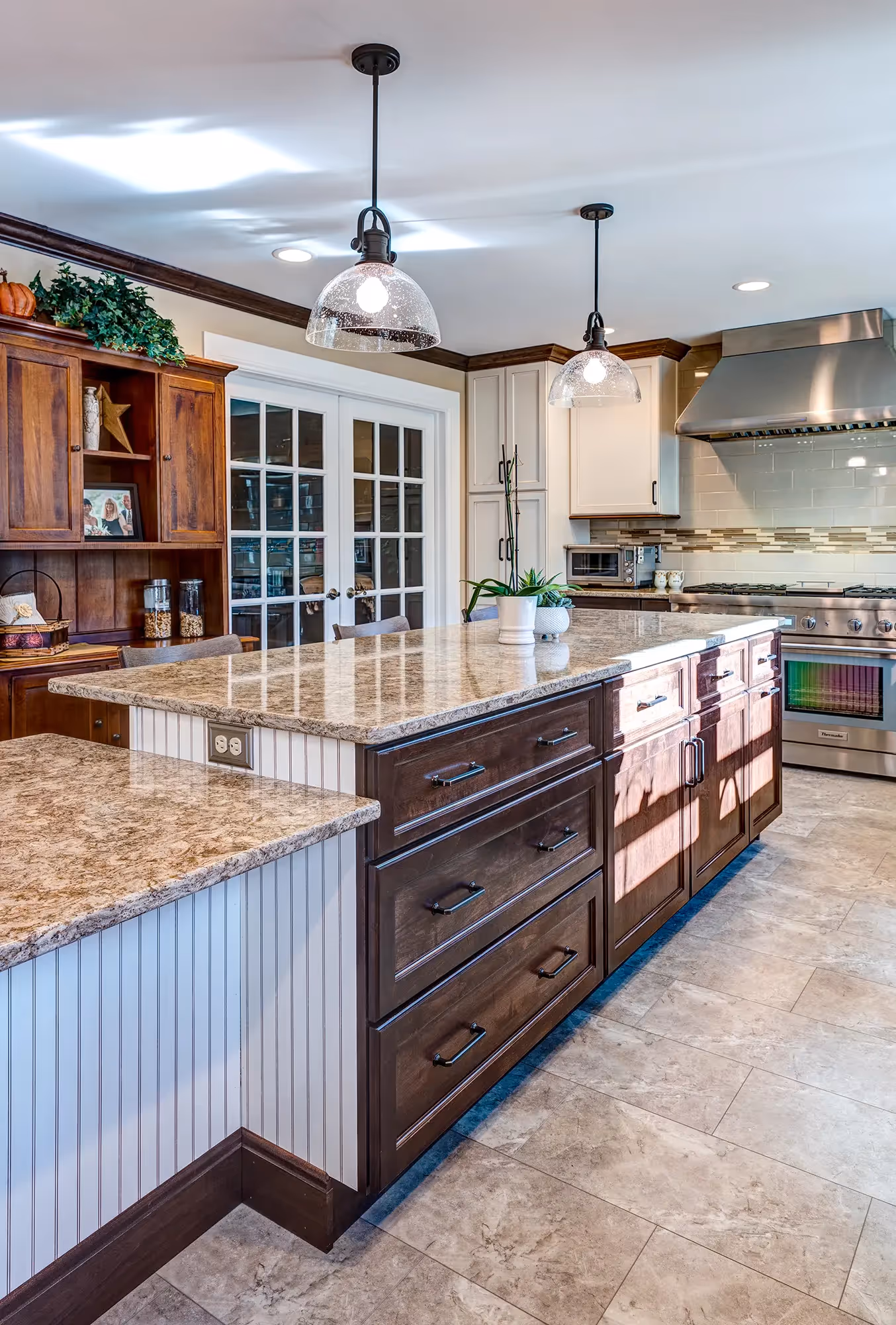 Bright kitchen featuring wood cabinets