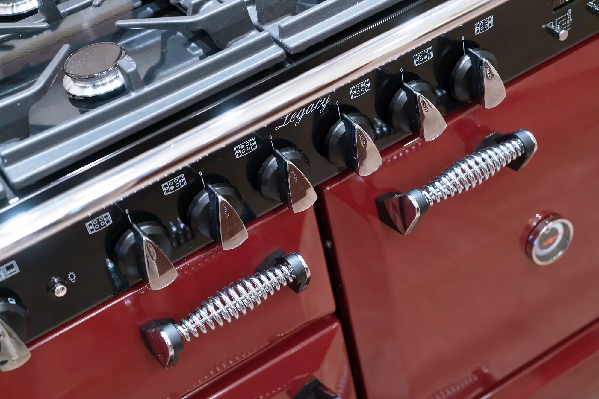 View of a red stove in a kitchen