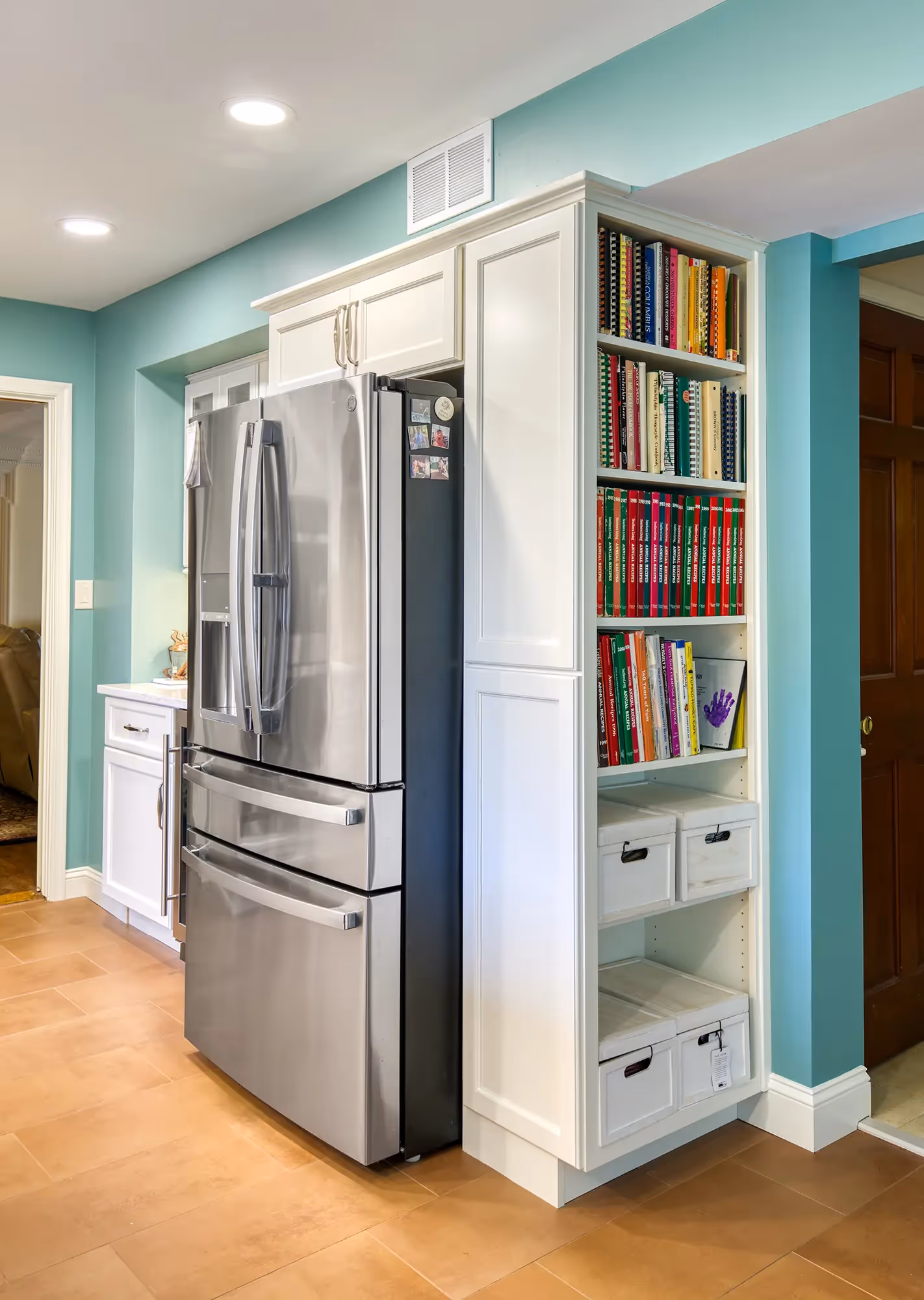 Refrigerator and cabinet storage in a bright