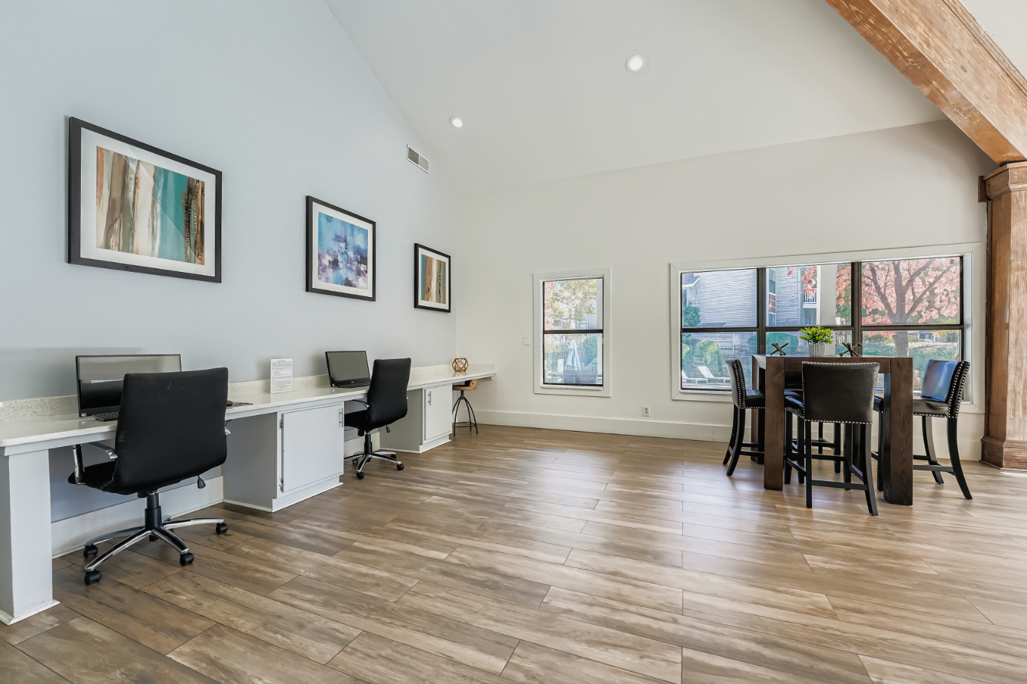 Business center with computers, desks, and chairs