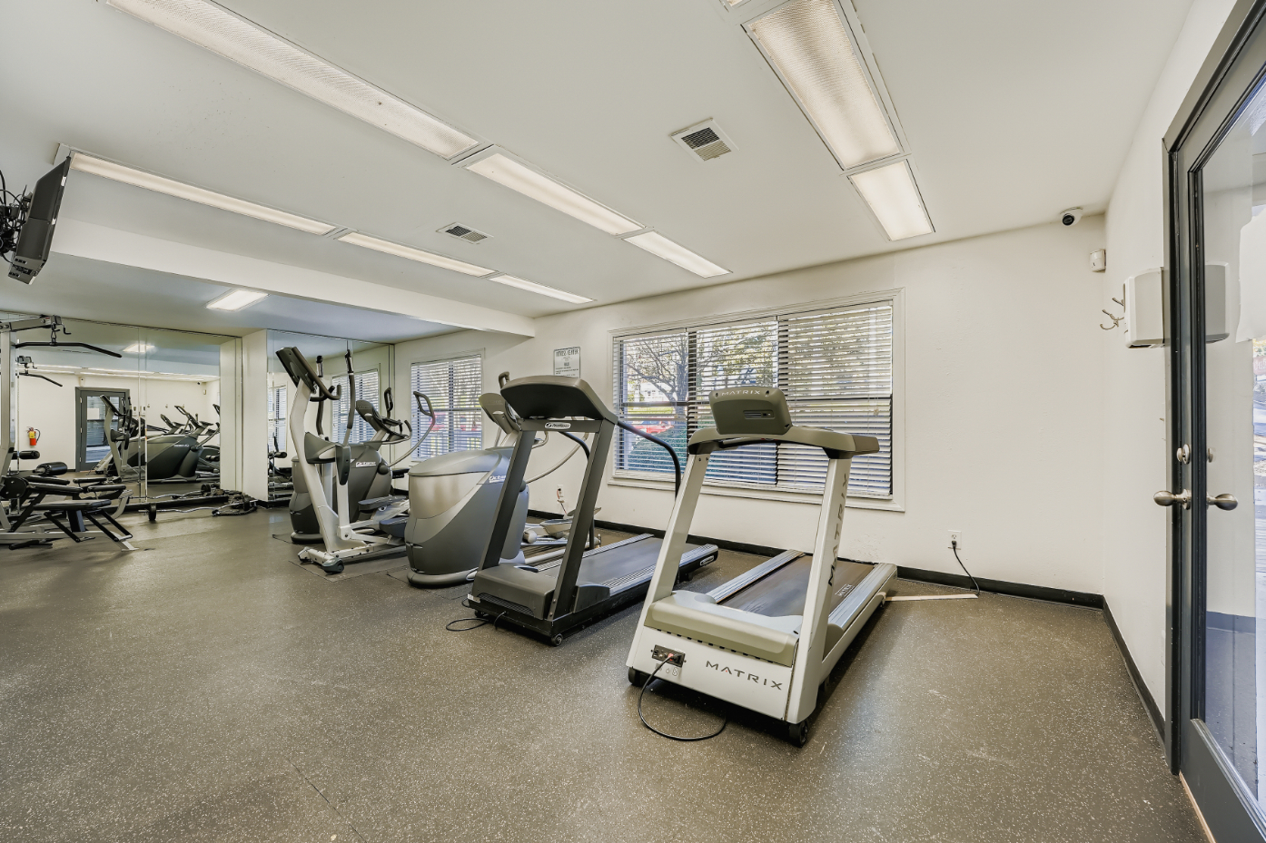 fitness center with leg cur machine