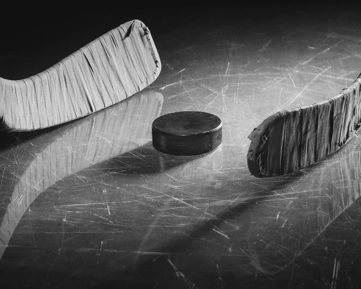 hockey-pucks-and-sticks