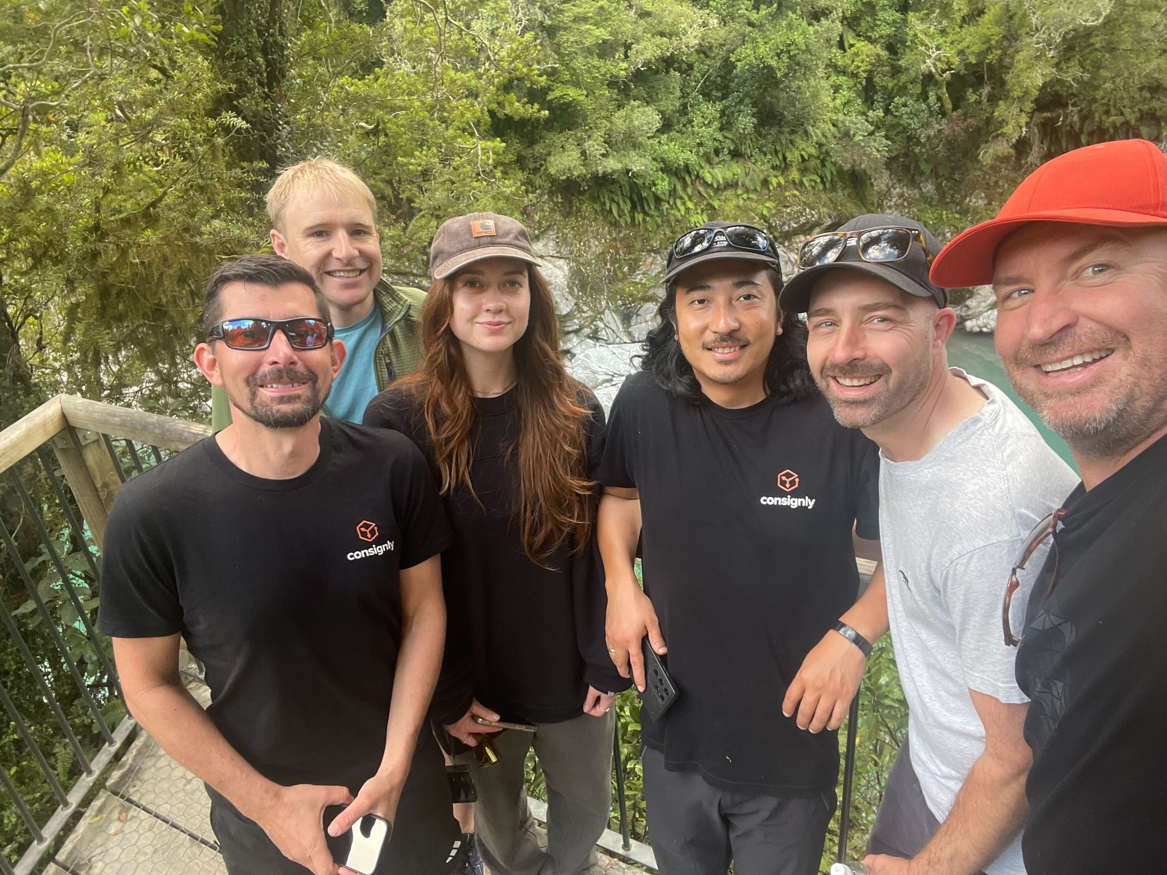 High angle photo of the team walking thorough a warehouse