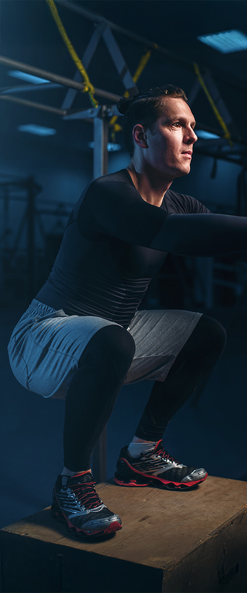 image of a professional cyclist being fitted in a bicycle shop's fitting area