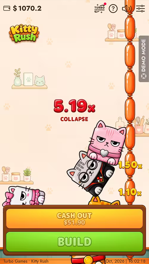 A gameplay screenshot of Kitty Rush by Turbo Games featuring a losing round where the tower of cats tumbles down