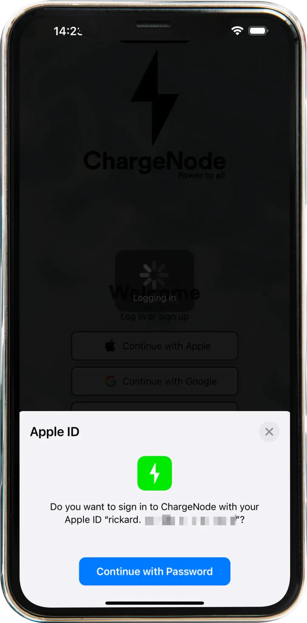 iPhone screen showing an Apple ID sign-in prompt asking to log in to ChargeNode with a partially blurred Apple ID, with a button labeled 'Continue with Password'.