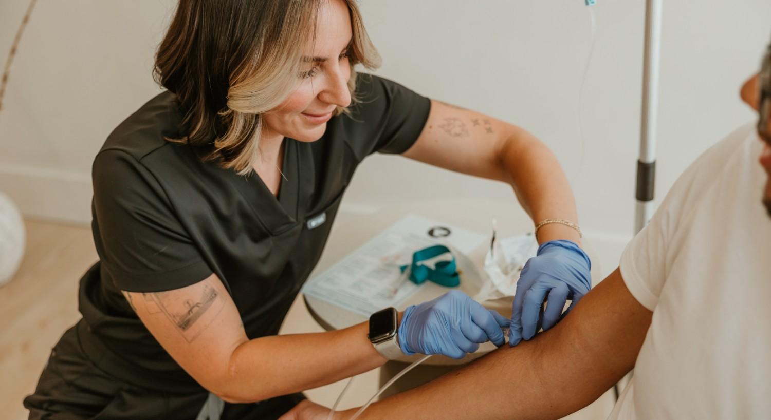 A woman in a black shirt and a man in a white shirt.