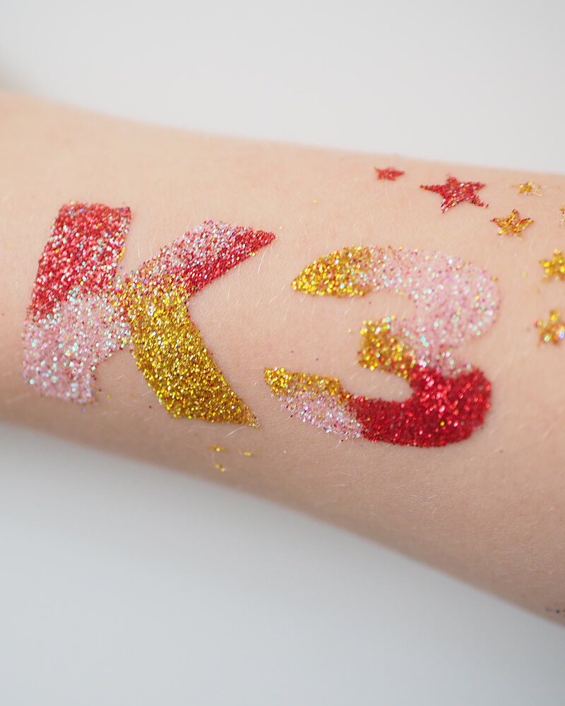 Foto van K3 glittertattoo.