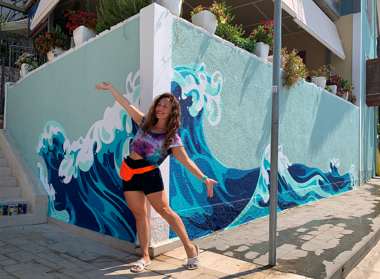 Ashley in front of the completed Marini Mural