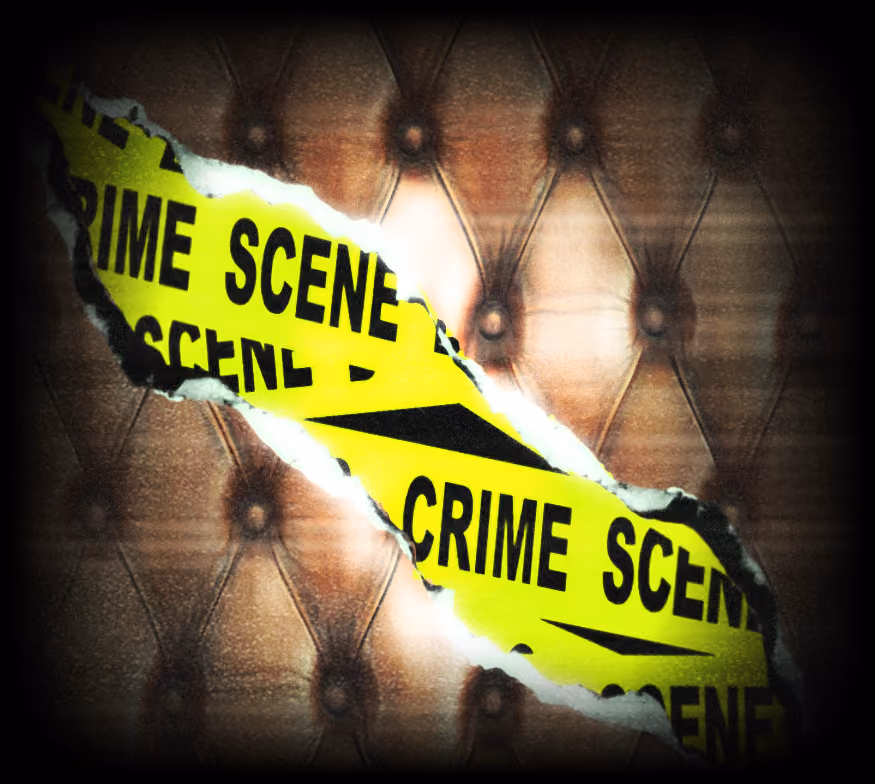 A chesterfield sofa with the a rip showing crime scene tape underneath