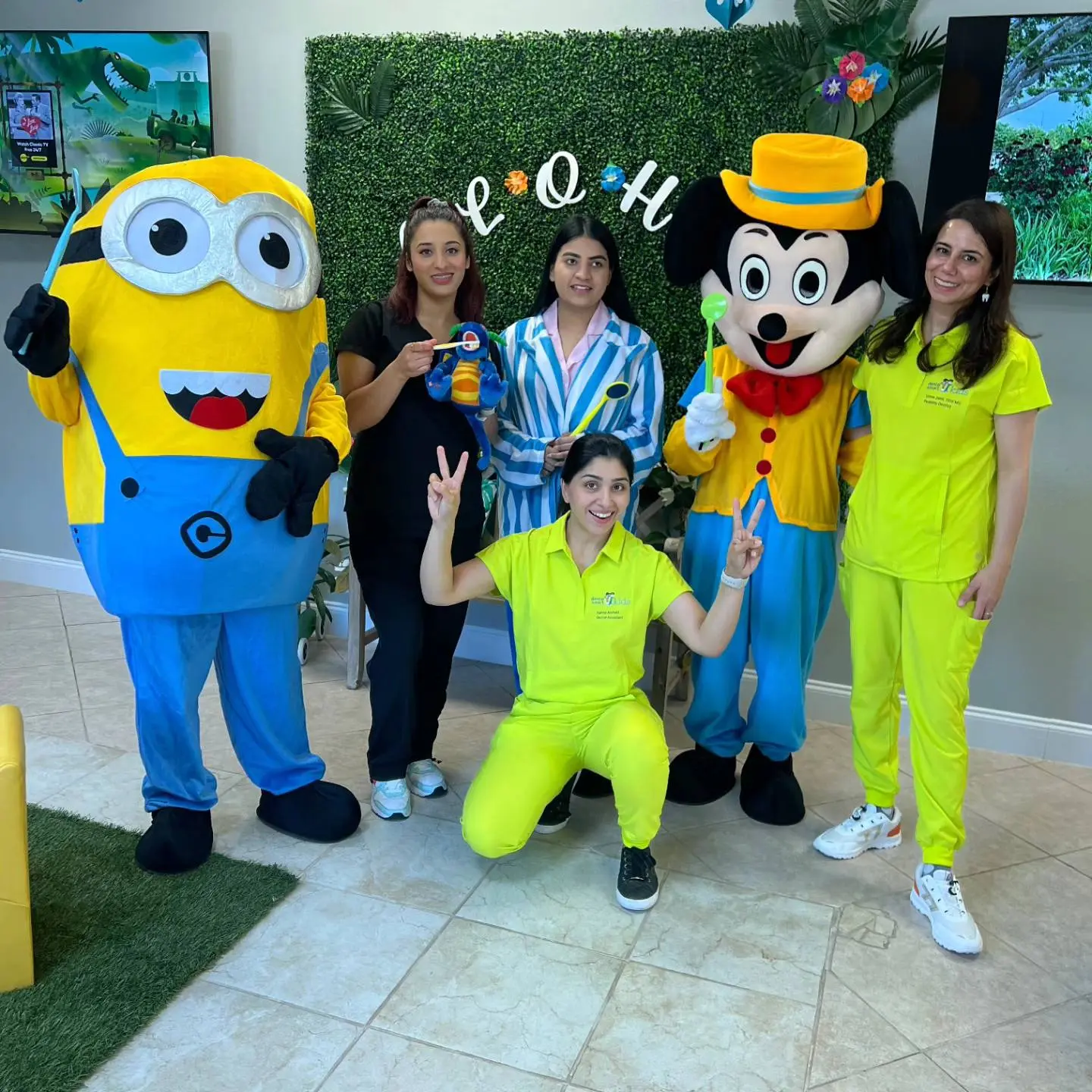 a diverse, modern nurse smiling warmly as they comfort a child patient