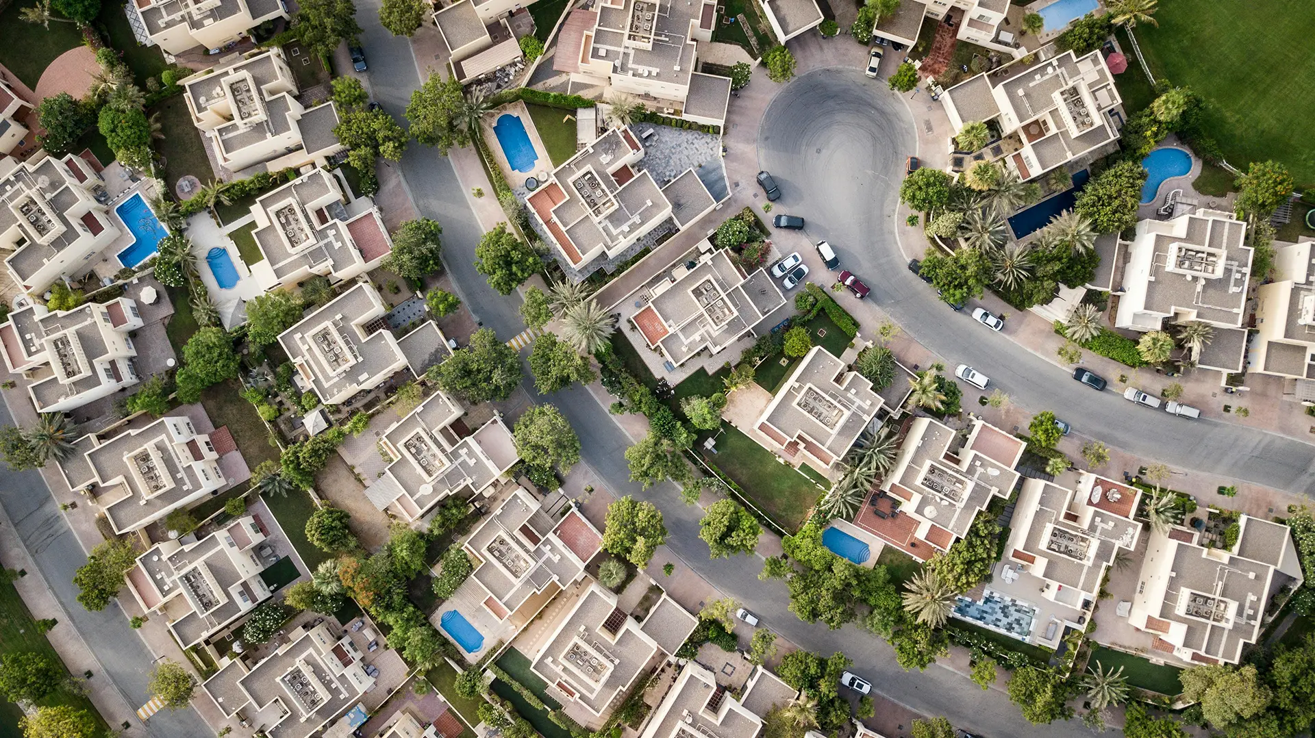 Top-down view of high value neighborhood with luxury villas.