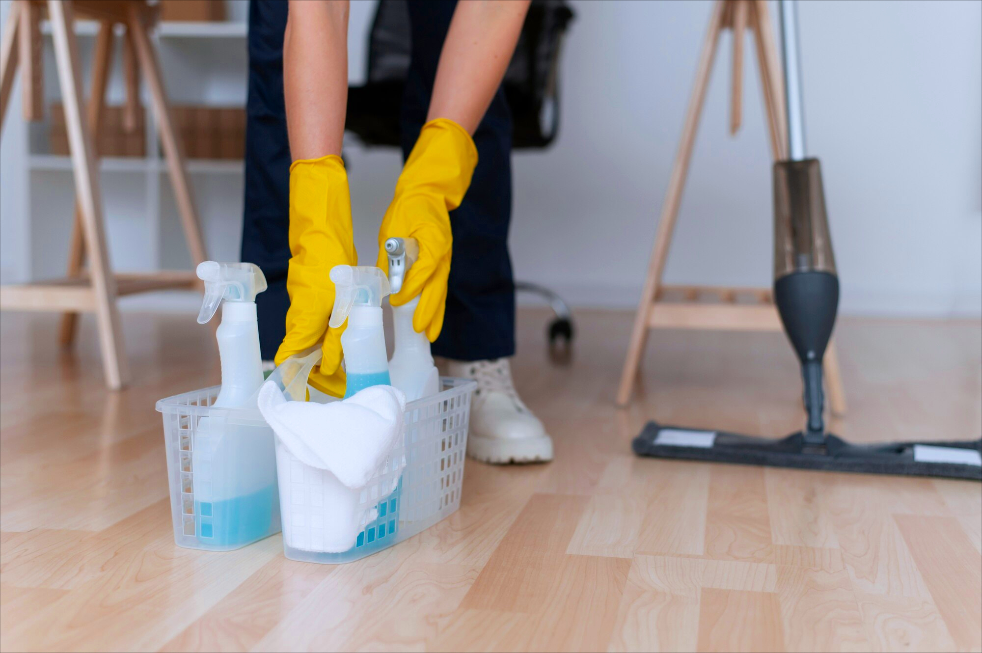 A cleaning specialist using proper cleaning tools.