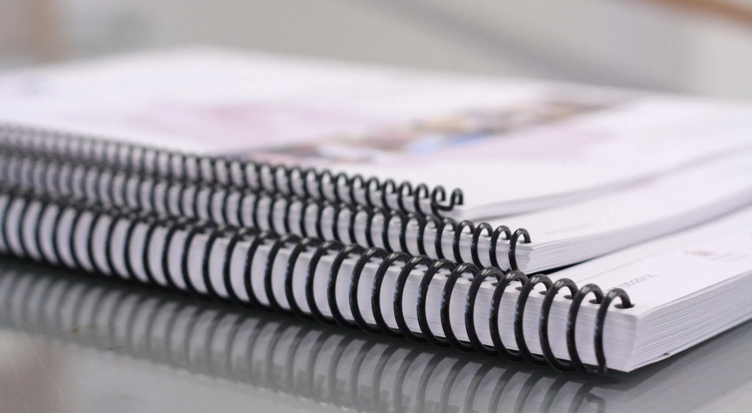 Plastic coil bound workbook