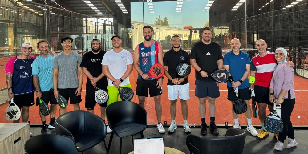 Padel equipment on a green court