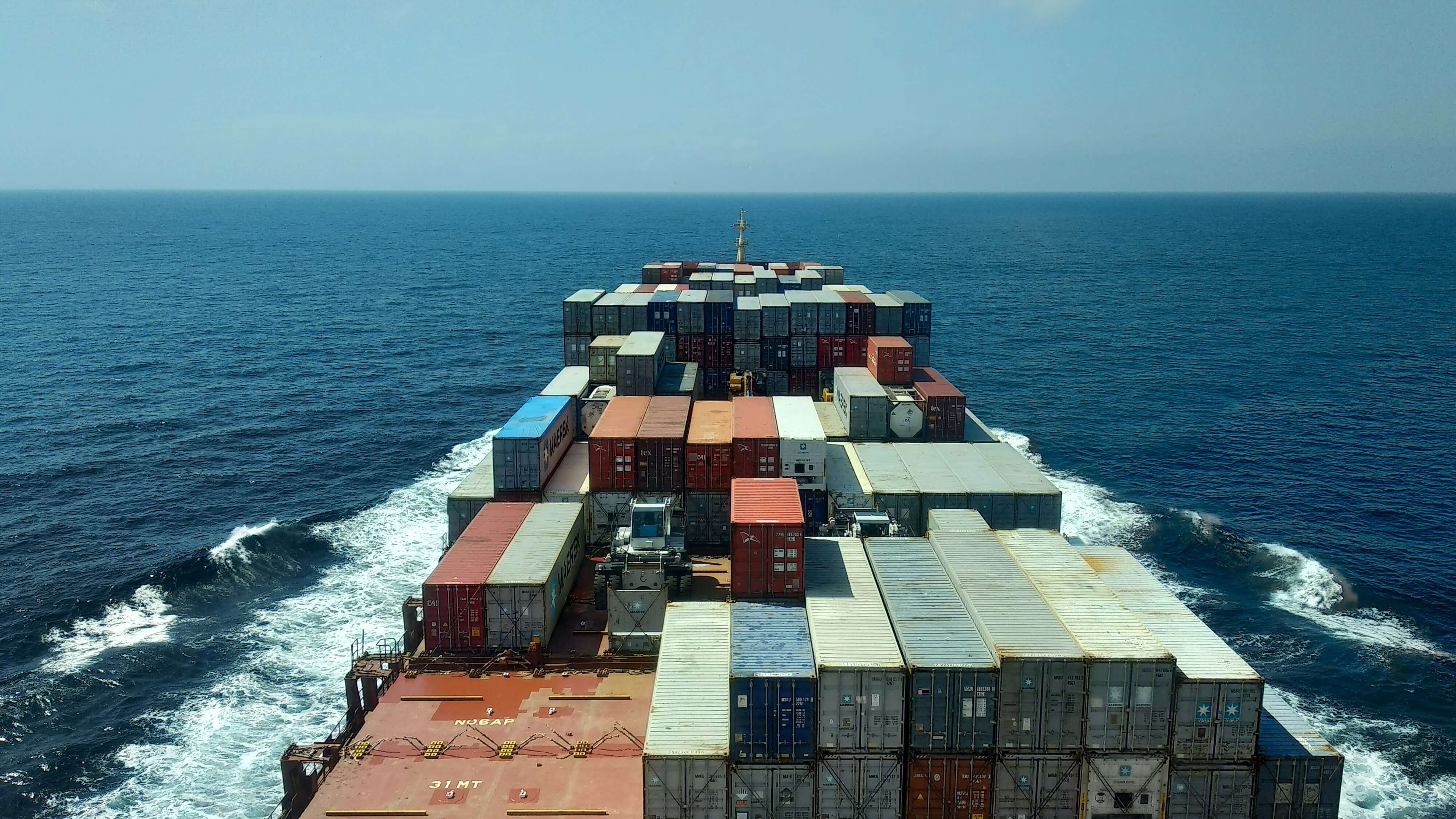 Container ship on open sea