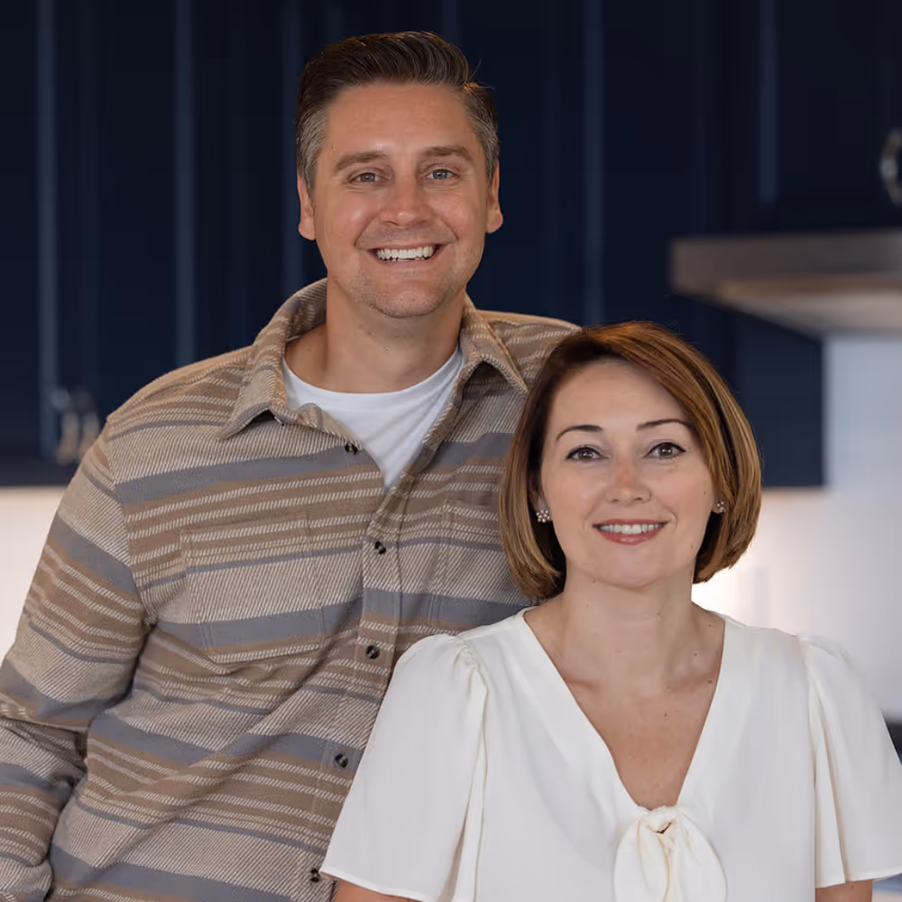 Racheal Bleicher standing with her husband